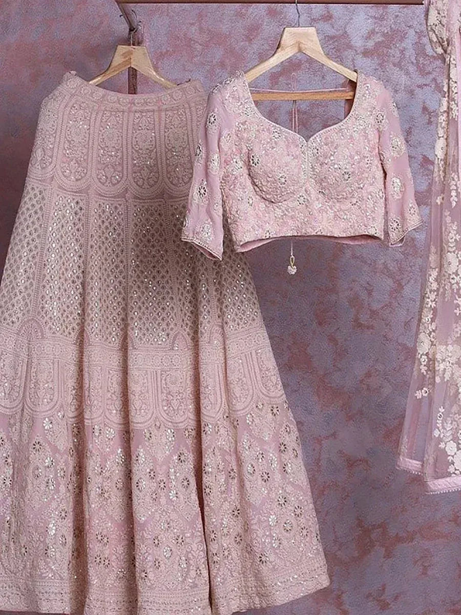 Pink embroidered lehenga choli with detailed work, perfect for Indian ethnic wear occasions