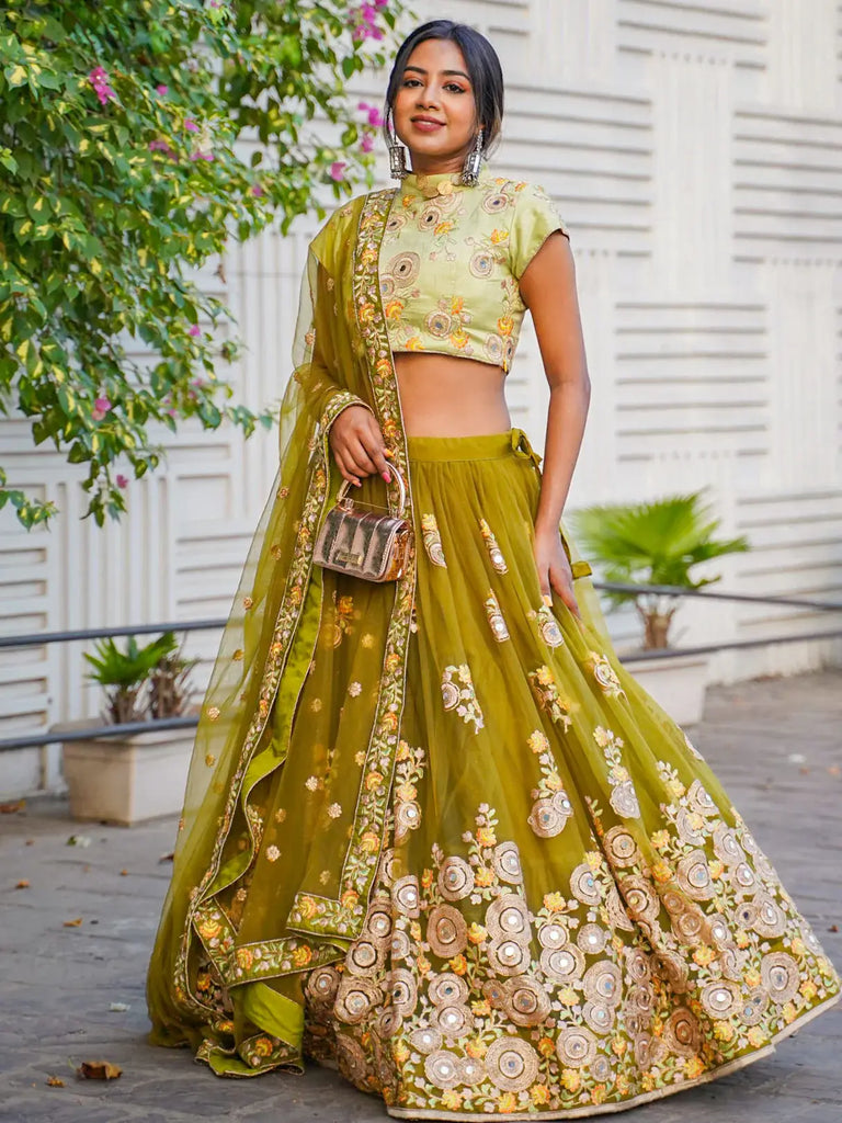 Ravishing Green Mirror Embroidered Net Reception Wear Lehenga Choli