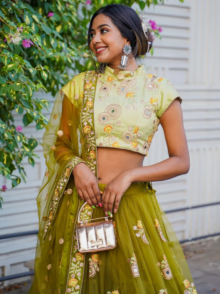 Ravishing Green Mirror Embroidered Net Reception Wear Lehenga Choli