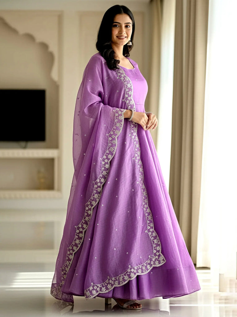 Beautiful Purple Zari Embroidered Silk Festive Wear Gown With Dupatta