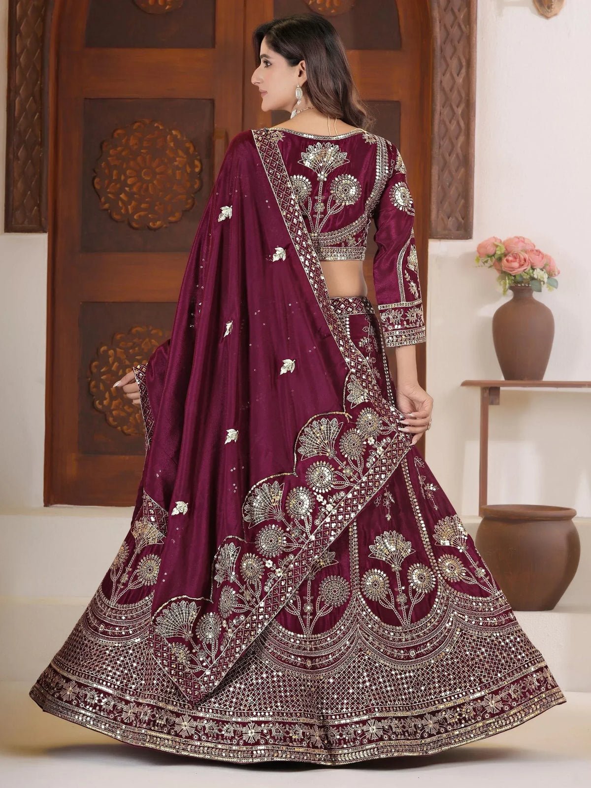 Maroon designer lehenga choli with gold embroidery and mirror work, ethnic Indian wear