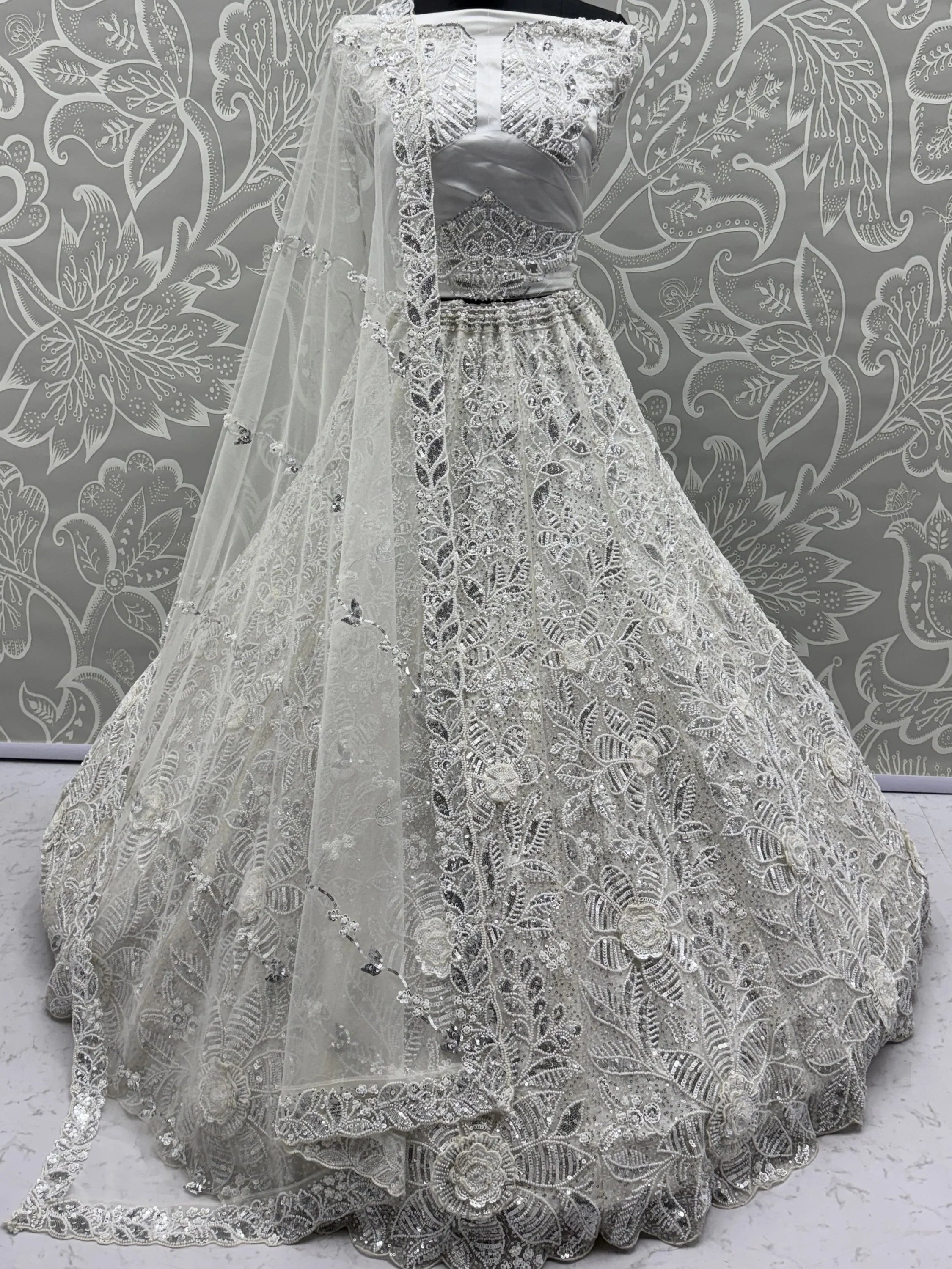 Captivating White Beads Work Net Reception Wear Lehenga Choli