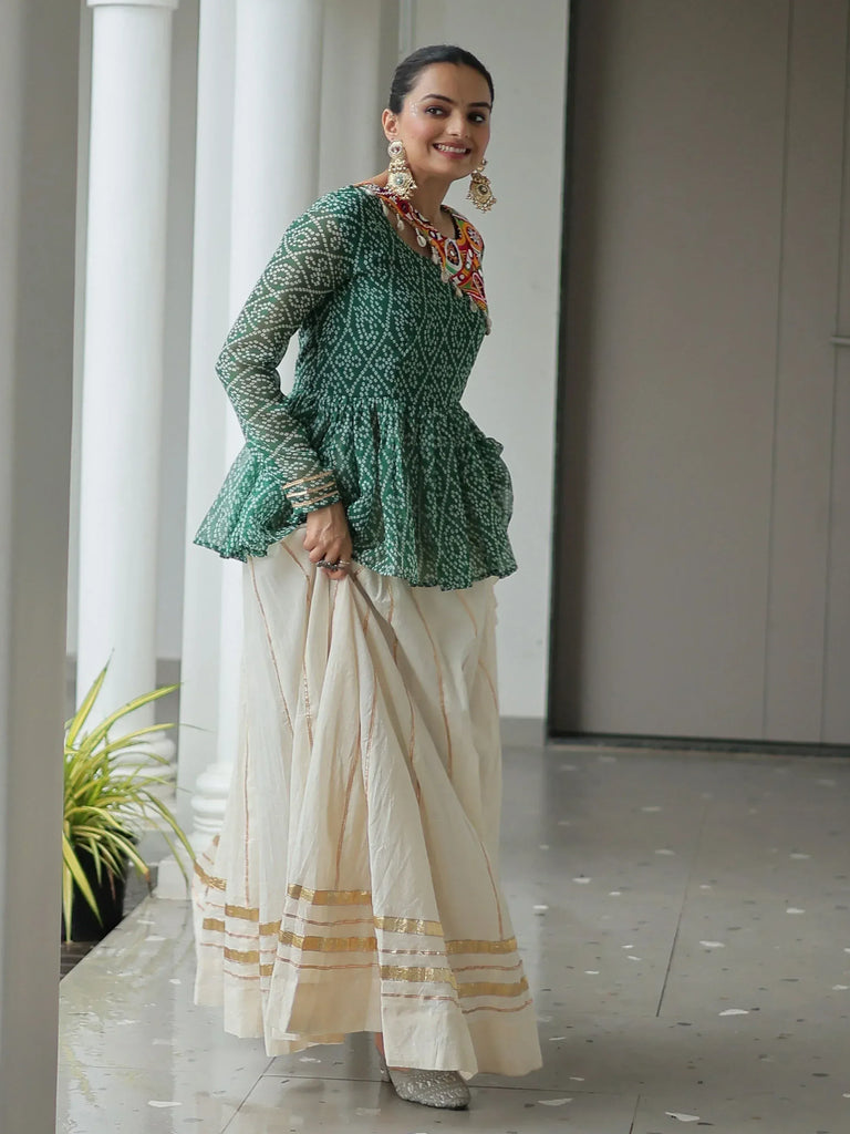 Green printed peplum top with white palazzo pants, ethnic Indian wear for women