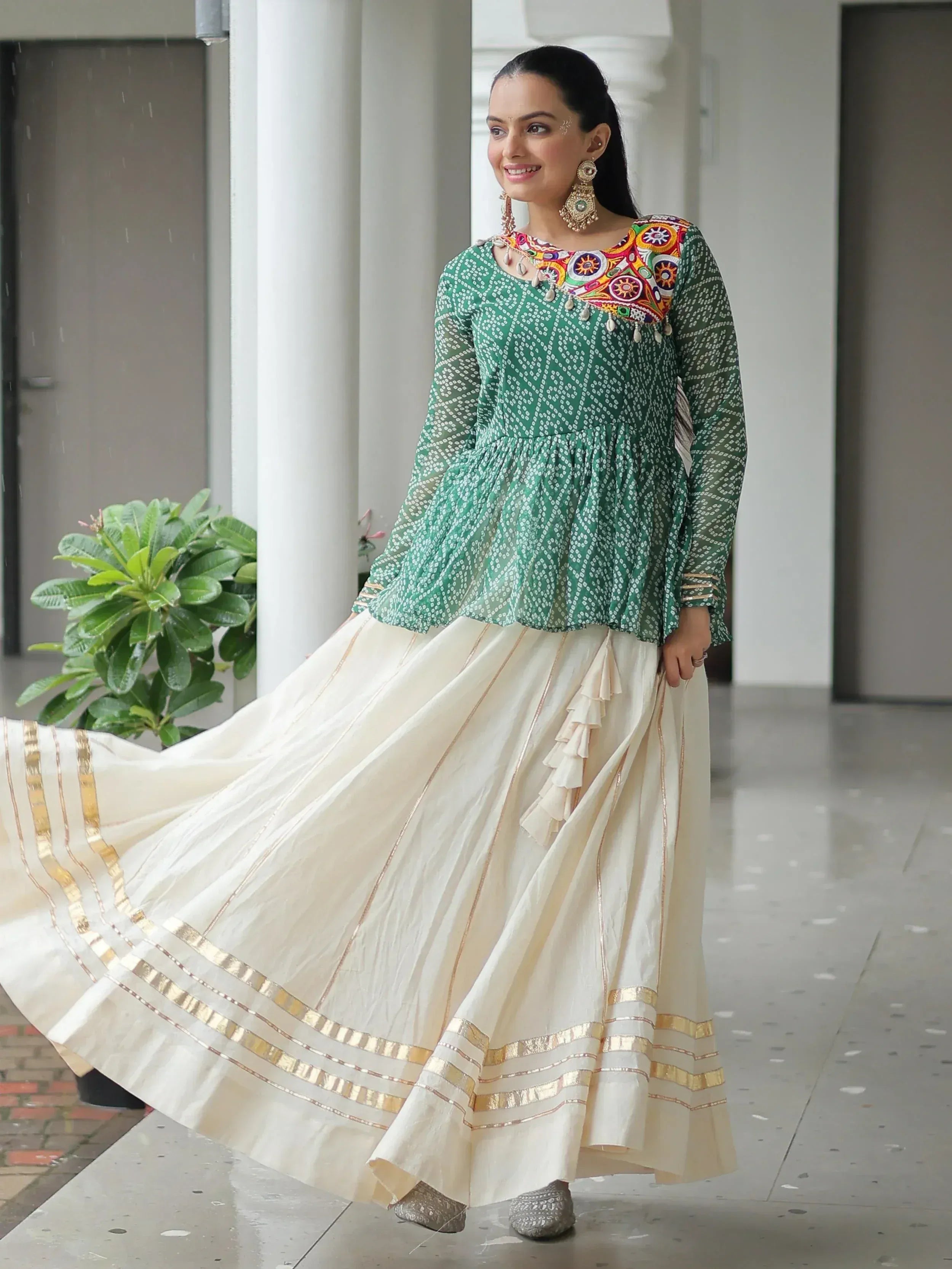 Green embroidered top with cream pleated skirt, Indian ethnic wear for women