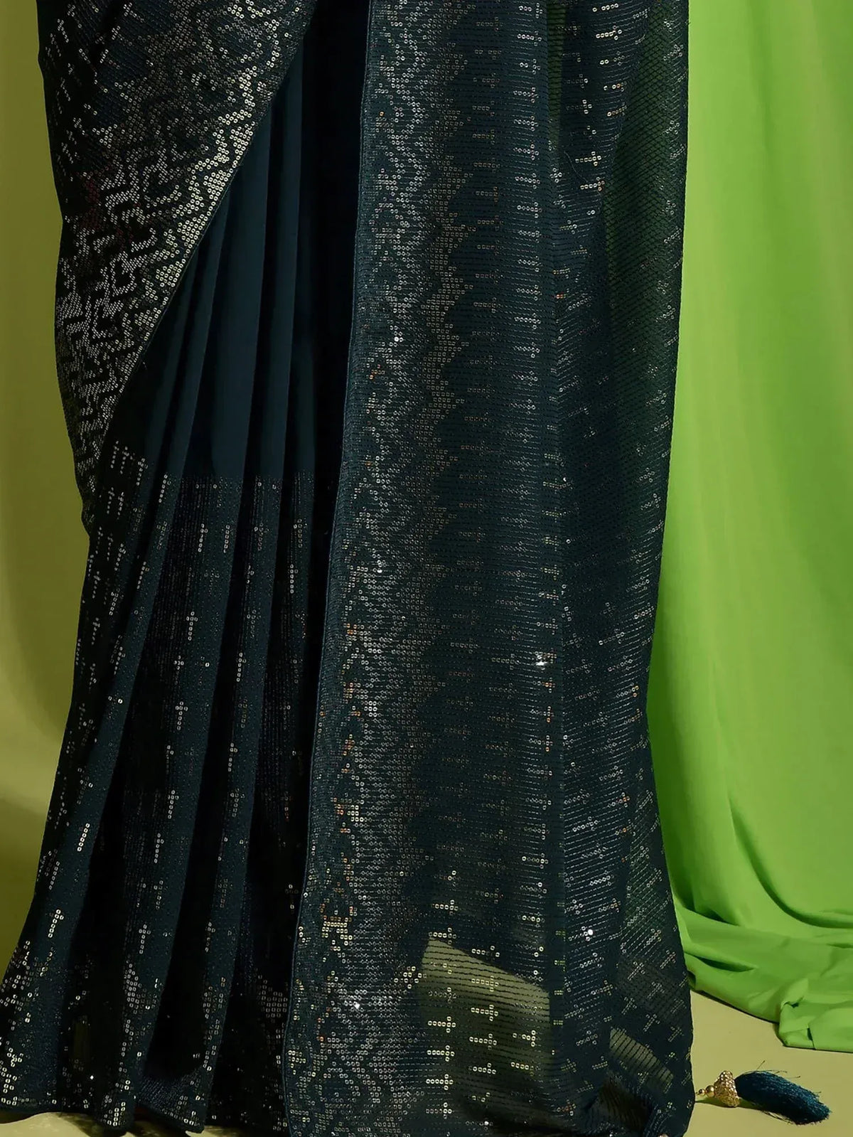Black sequin saree with sheer overlay, perfect for Indian ethnic wear events