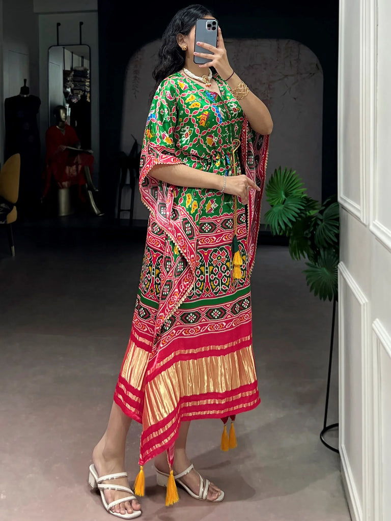Attractive Green Ikkat Printed Gaji Silk Mehendi Wear Kaftan