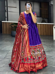 Enchanting Purple Patola Printed Dola Silk Traditional Gown With Dupatta