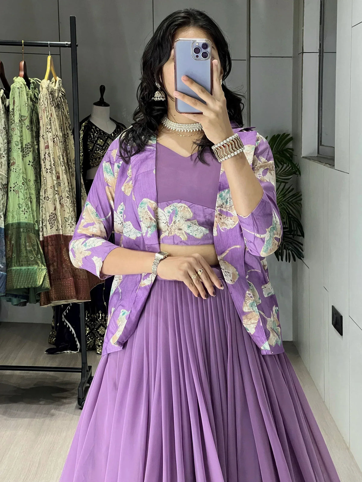 Purple floral print lehenga choli with pleated skirt, perfect for Indian ethnic wear and designer occasions.