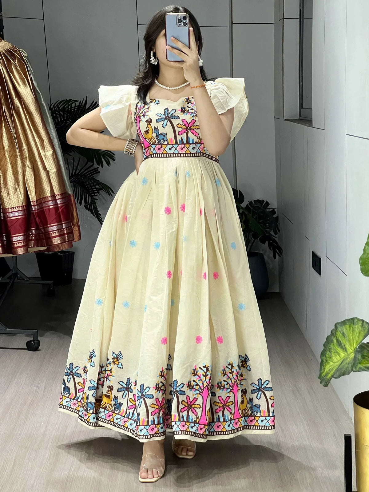 Cream ethnic gown with colorful palm tree & animal print, puffed sleeves, perfect for Indian occasions