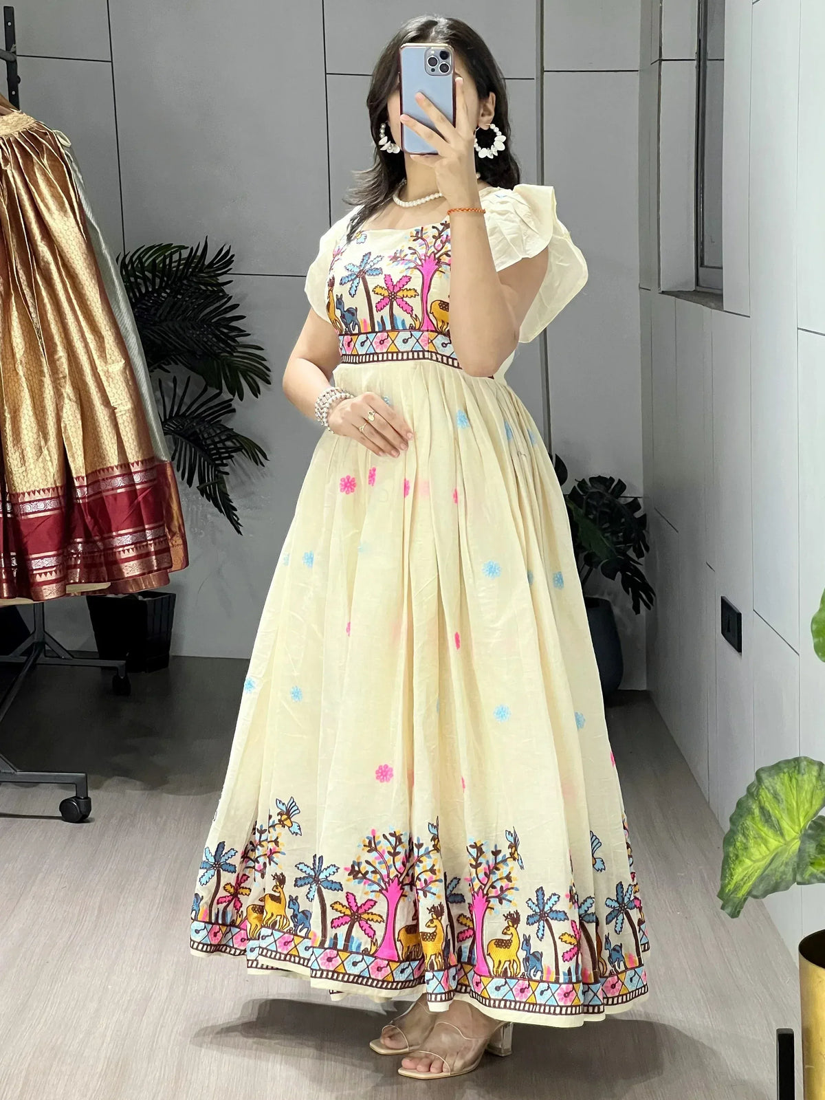 Cream ethnic gown with colorful tree & deer print, puff sleeves, perfect for festive occasions