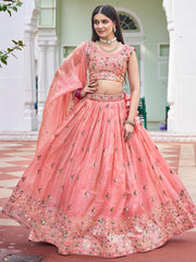 Adorable Peach Embroidered Crushed Wedding Wear Lehenga Choli