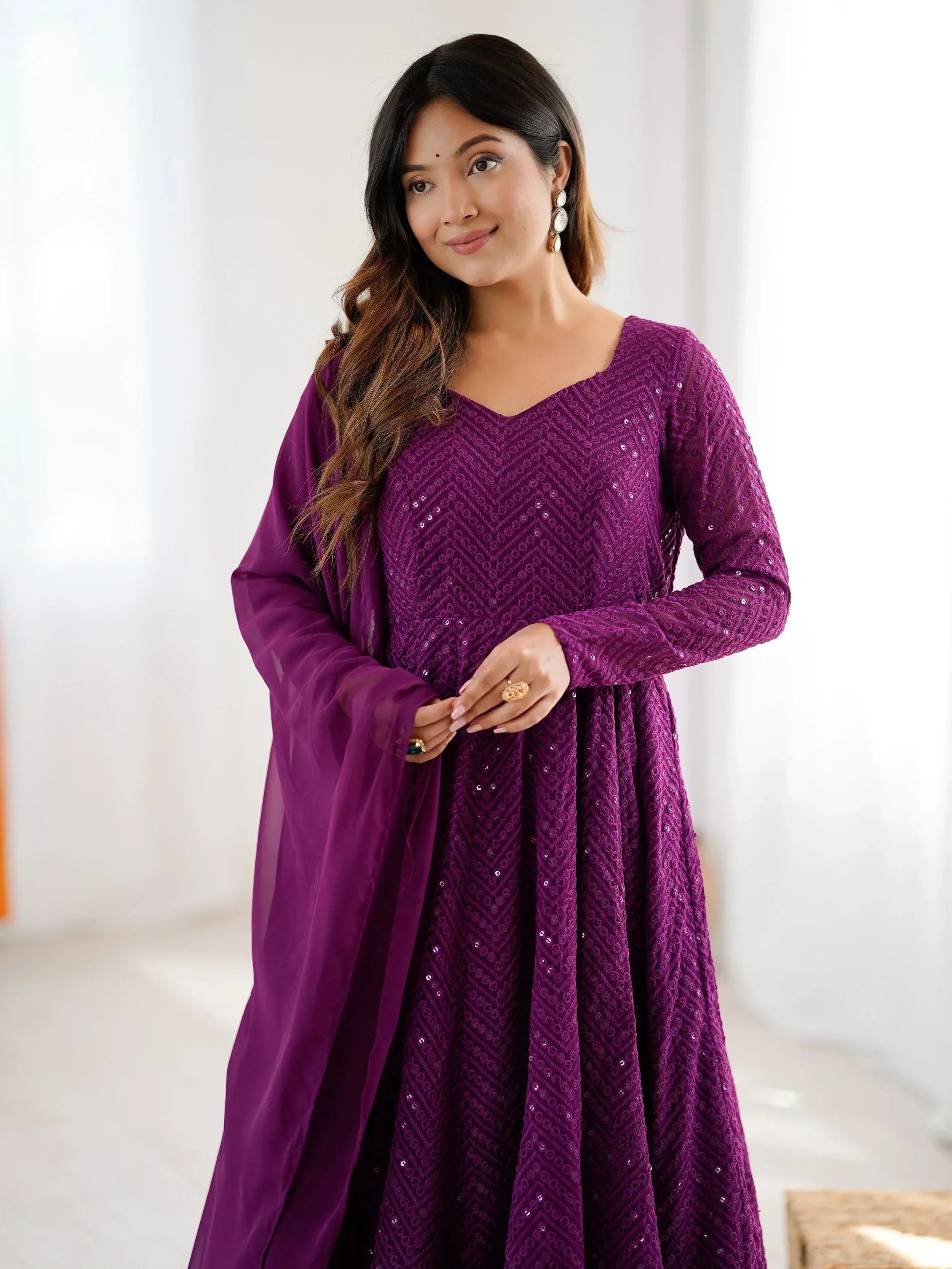 Purple sequin embroidered ethnic gown with matching dupatta, perfect for Indian occasions