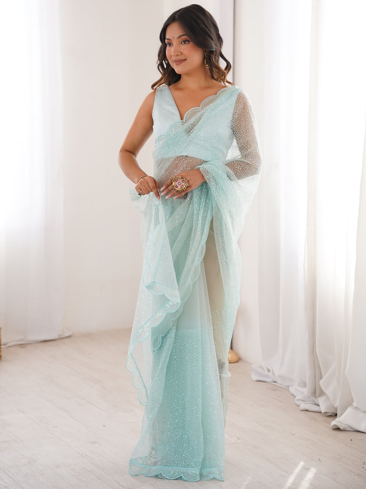 Glowing Sky Blue Sequins Net Event Wear Saree With Blouse