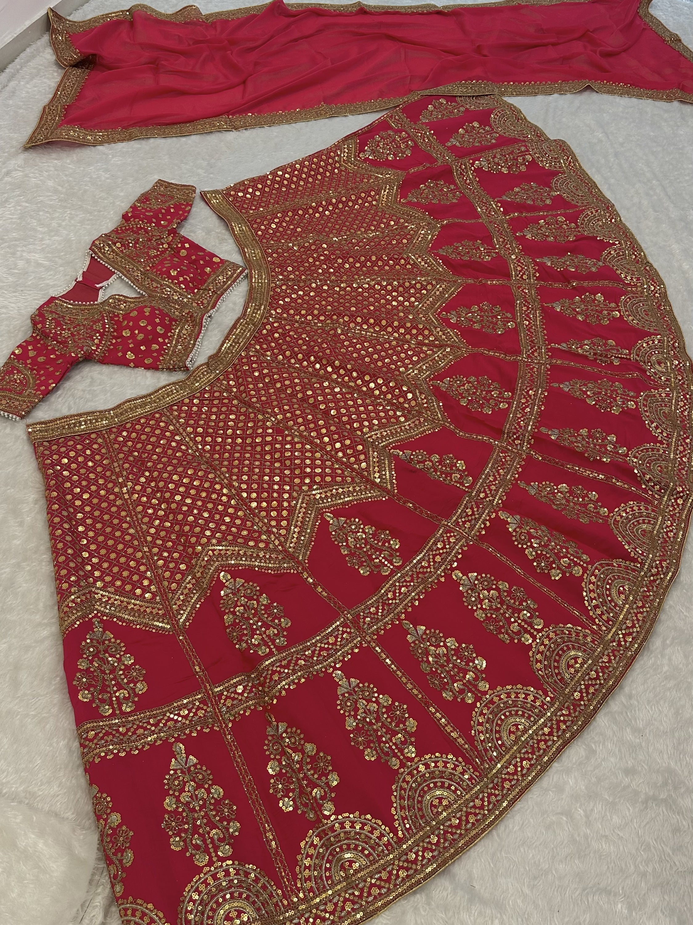 Notable Red Zari Embroidered Silk Wedding Wear Lehenga Choli With Dupatta