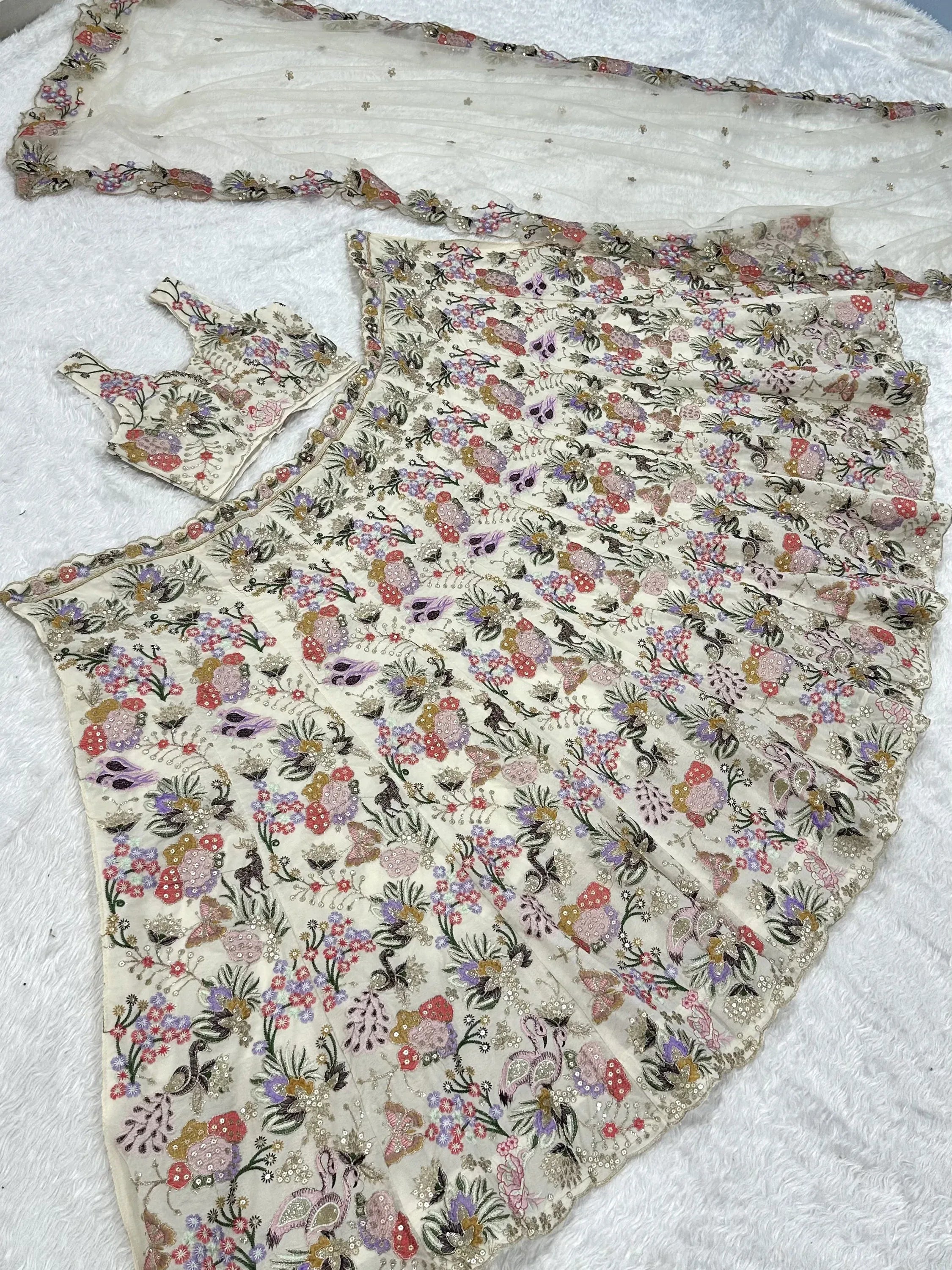 Grand Off-White Floral Embroidery Georgette Reception Wear Lehenga Choli