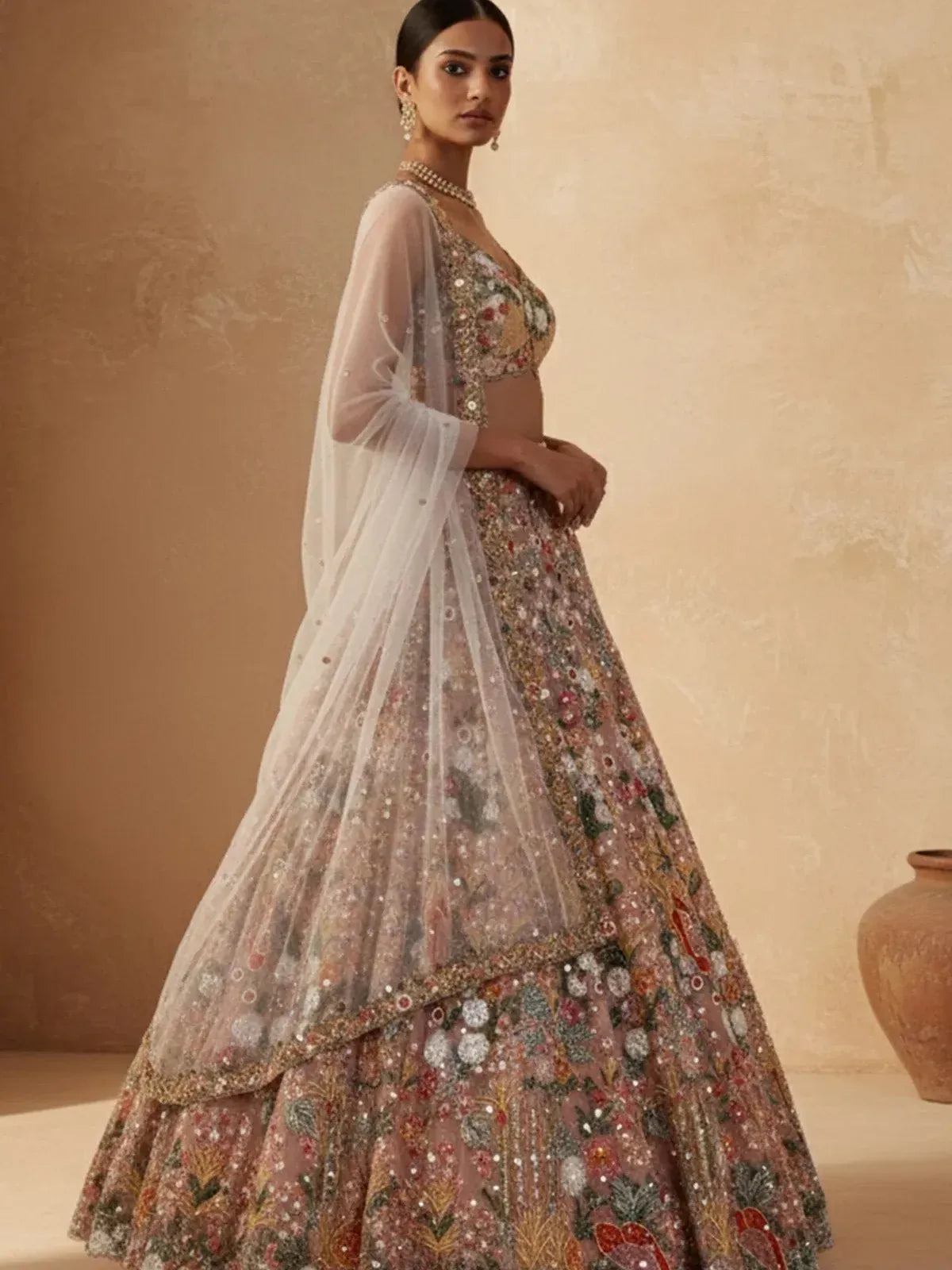 Notable Dusty Peach Dori Embroidered Net Party Wear Lehenga Choli