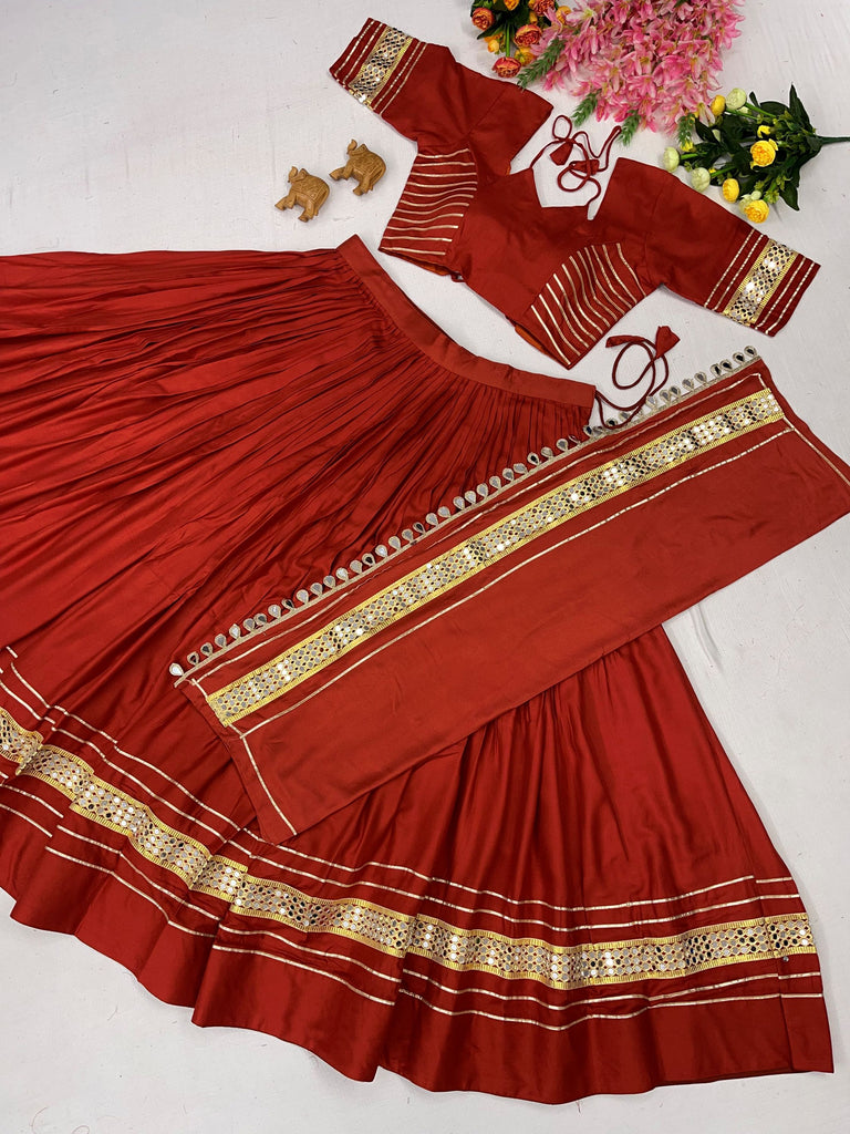 Stylish Rust Orange Mirror Laced Cotton Navratri Special Lehenga Choli