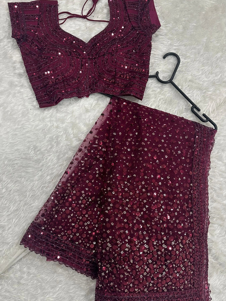 Glamourous Wine Sequins Net Festival Wear Saree With Blouse