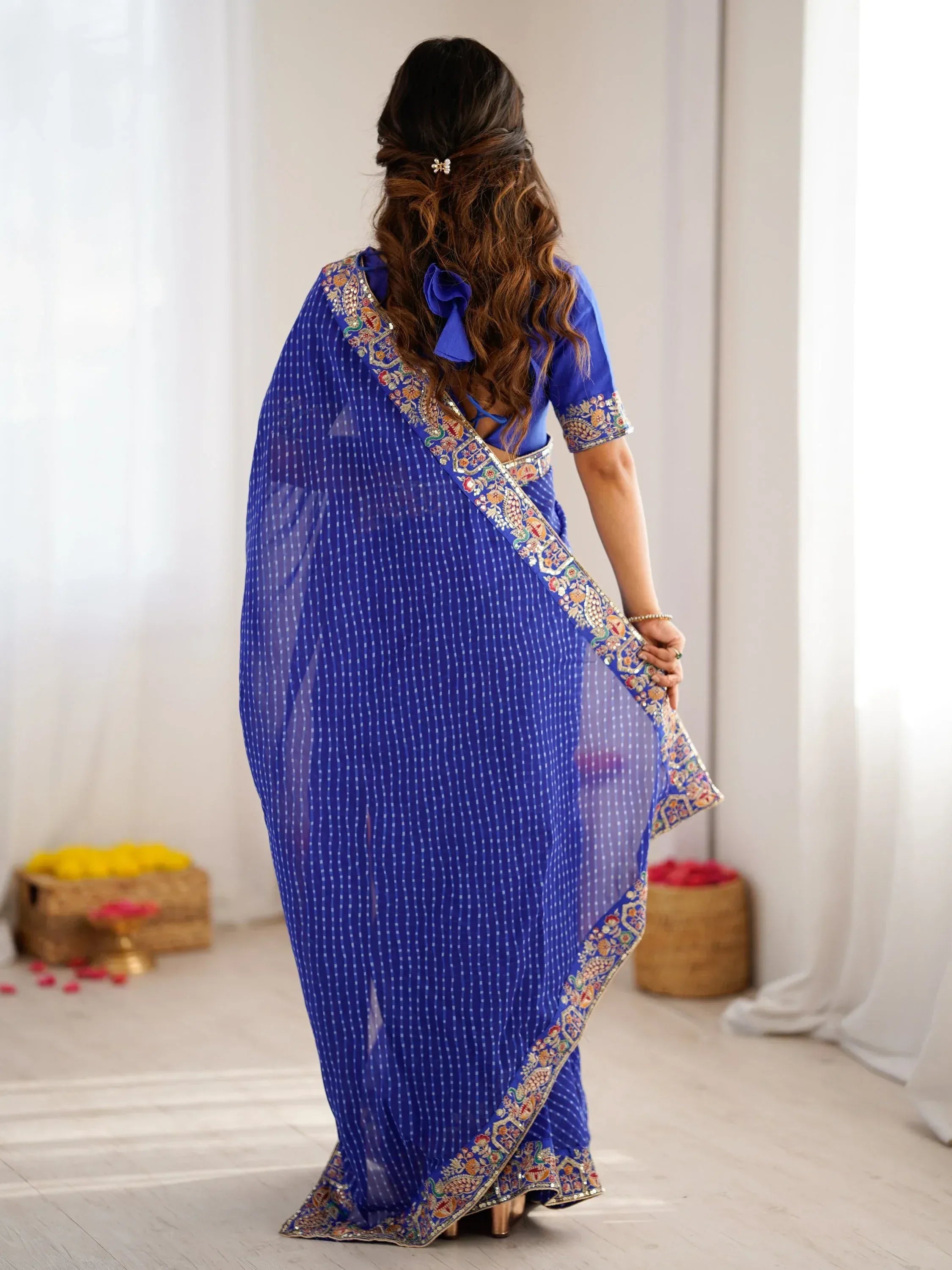 Stylish Blue Border Work Georgette Function Wear Saree With Blouse