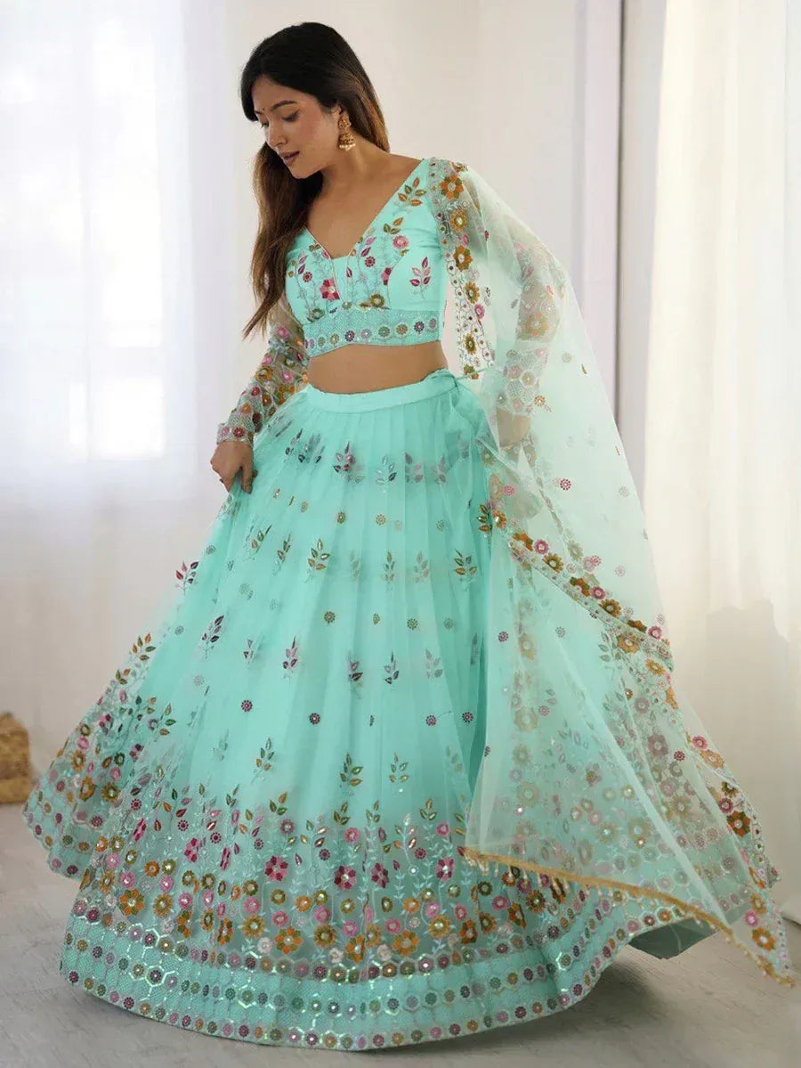 Mint green floral embroidered lehenga choli with sheer dupatta, perfect for Indian ethnic occasions