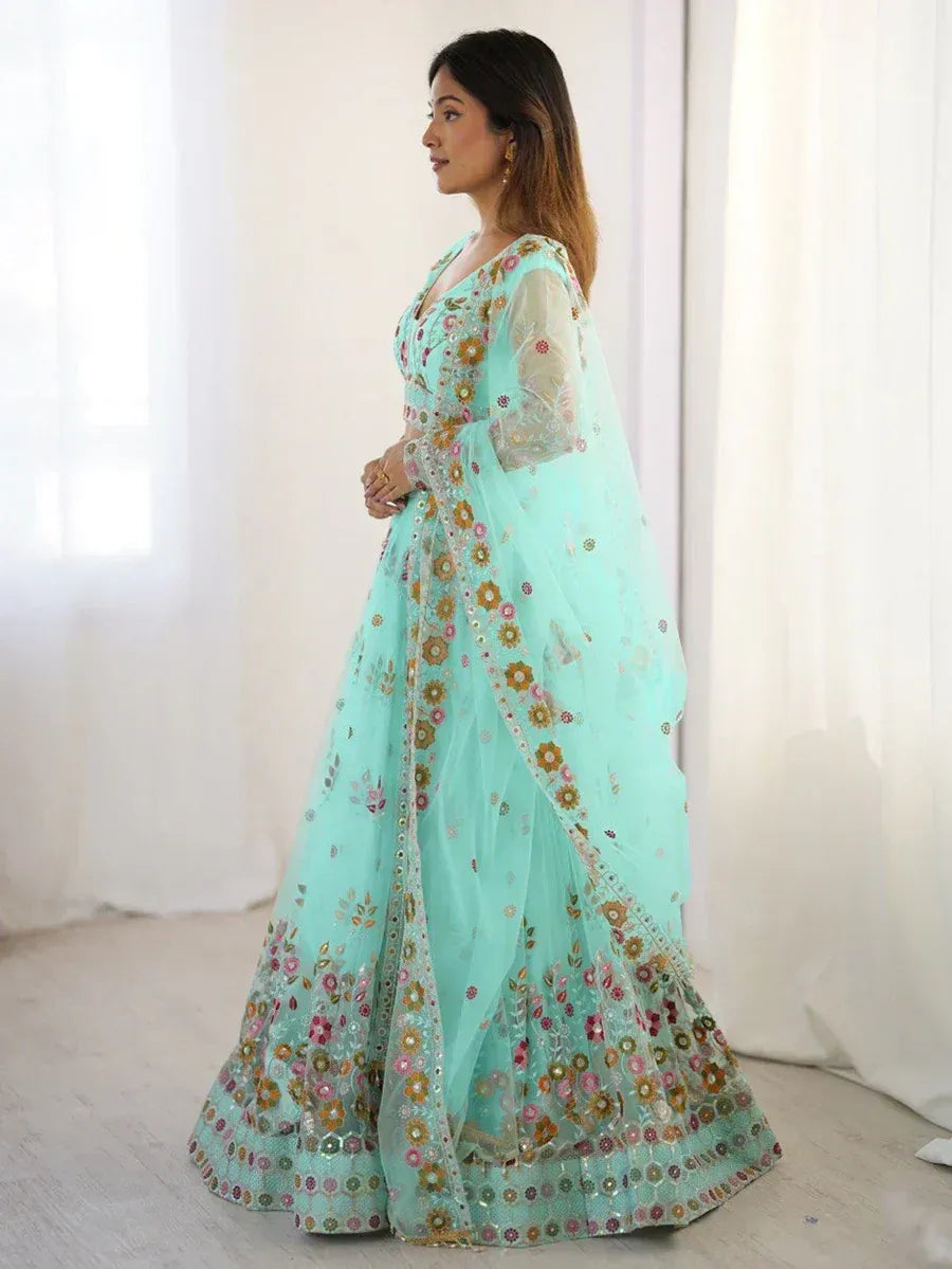 Mint green designer lehenga choli with floral embroidery and sheer dupatta, ethnic wear for women