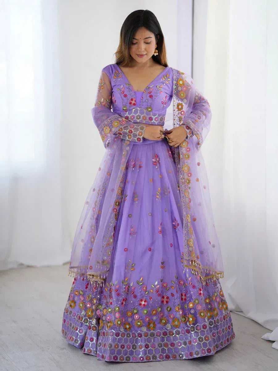 Purple floral embroidered lehenga choli with sheer sleeves, perfect for Indian ethnic occasions