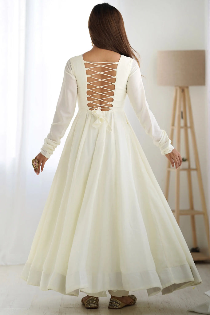 Adorable Off-White Silk Anarkali Gown With Heavy Pink Dupatta