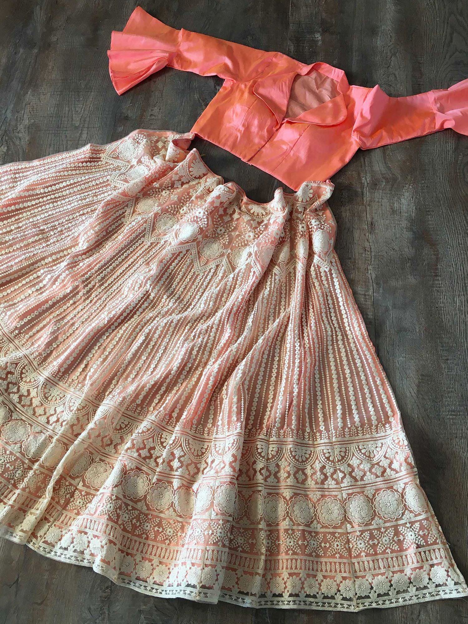 Lavishing Peach Net Lakhnavi Work Party Wear Crop Top Lehenga
