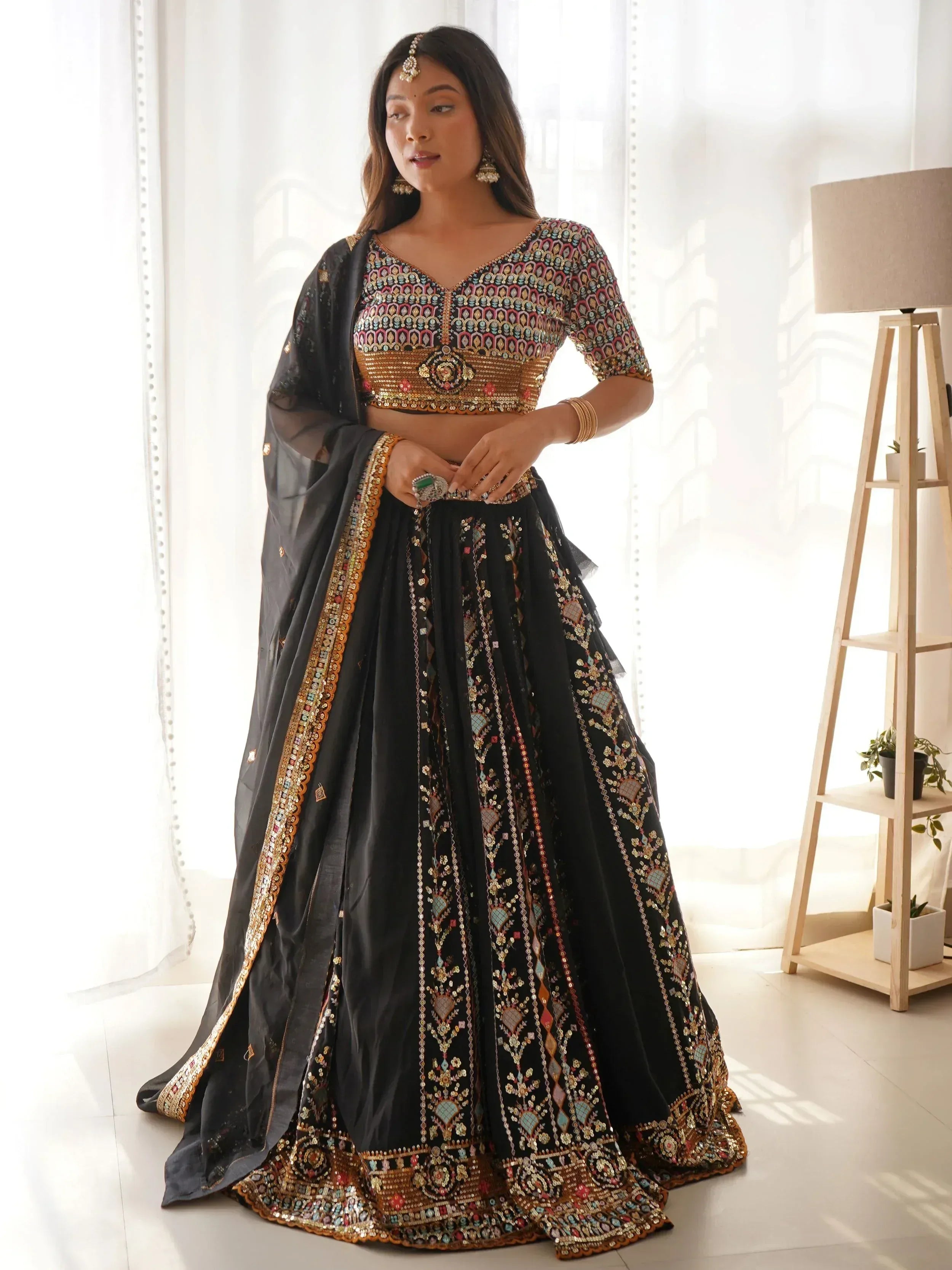 Black embroidered lehenga choli with colorful mirror work and dupatta, Indian ethnic wear