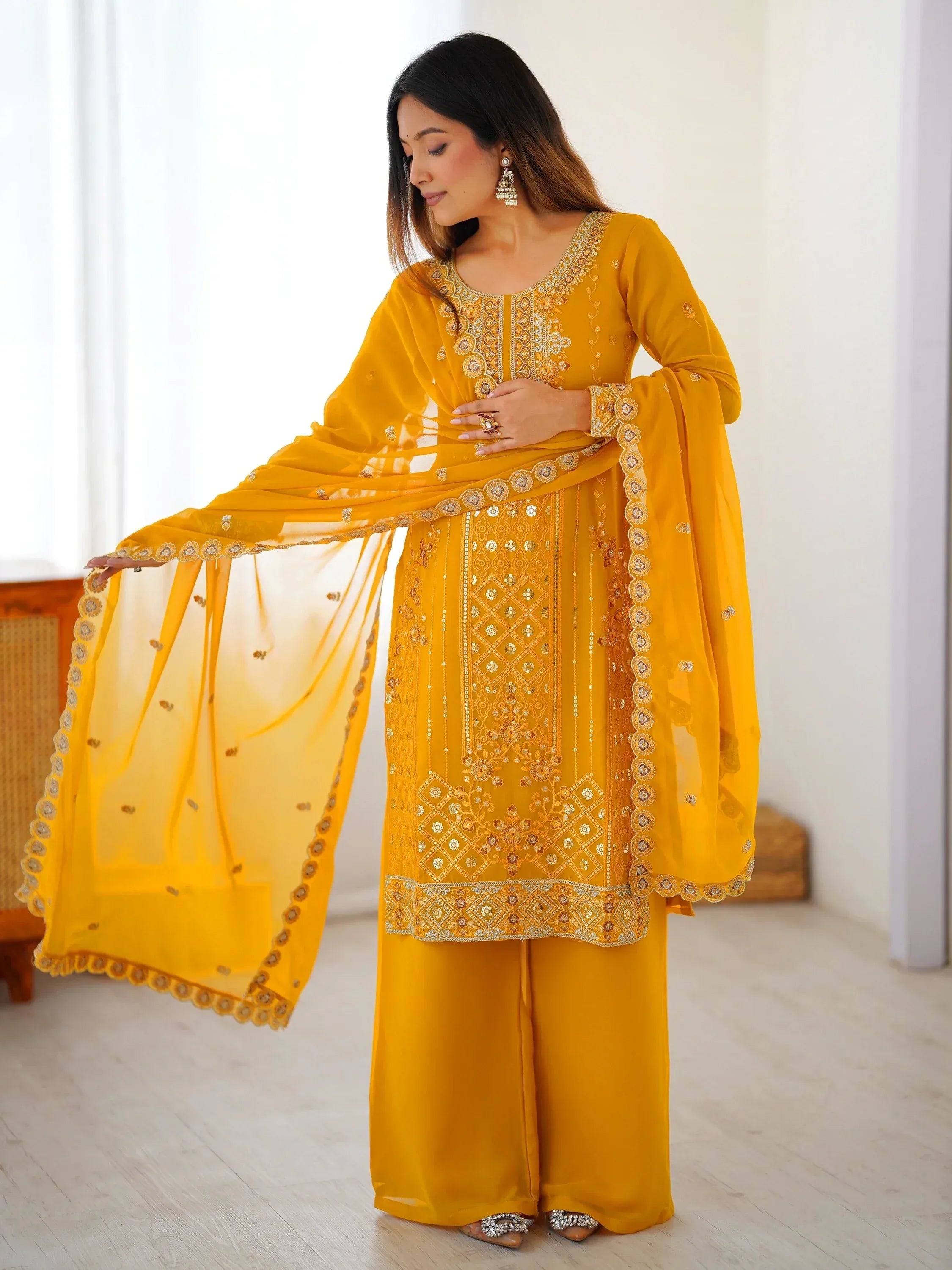 Outstanding Yellow Embroidered Georgette Haldi Wear Palazzo Suit