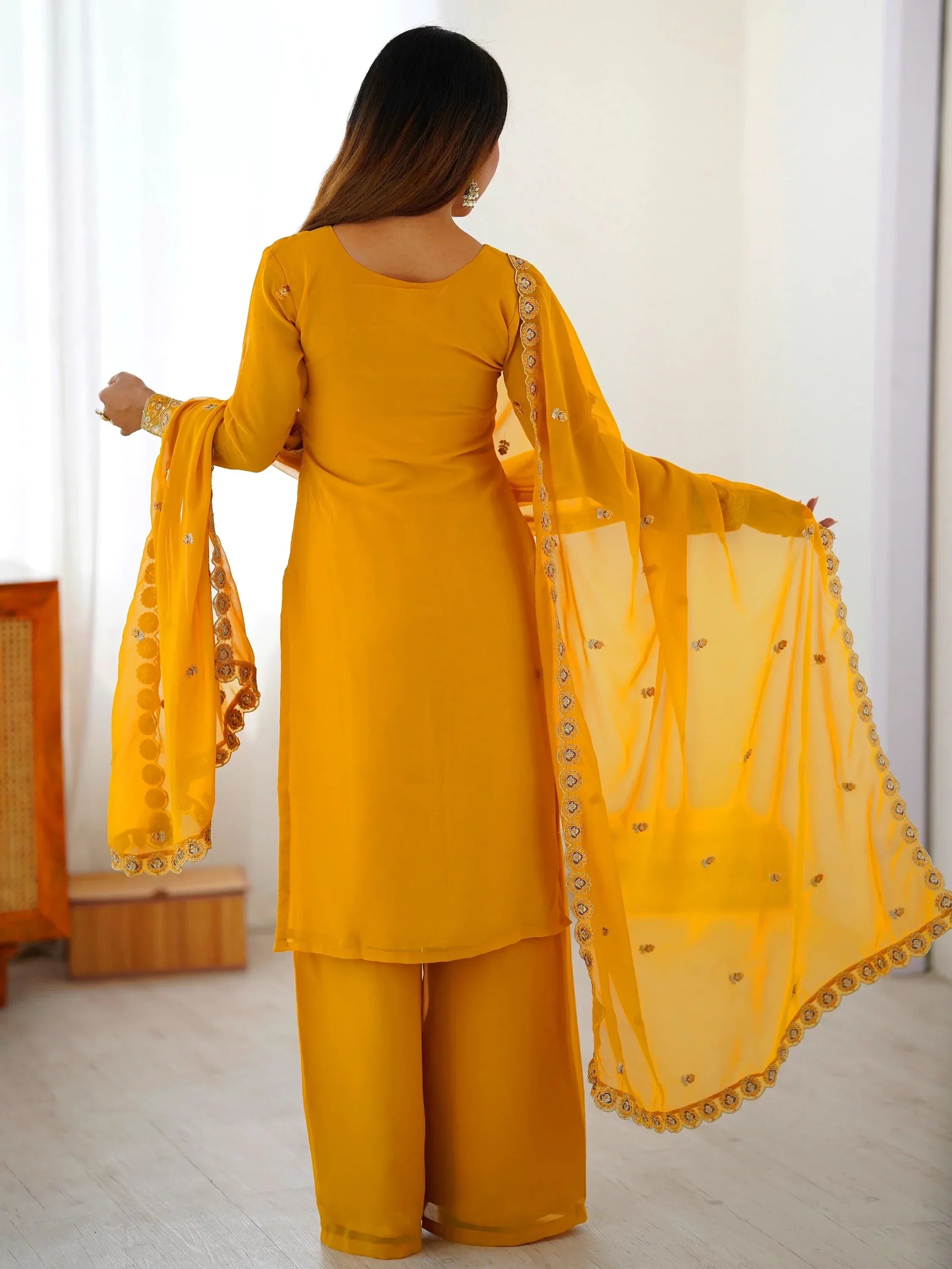 Outstanding Yellow Embroidered Georgette Haldi Wear Palazzo Suit