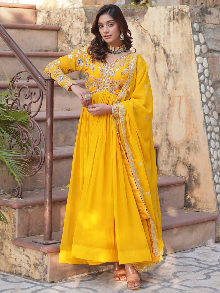 Artistic Yellow Thread Work Georgette Haldi Wear Gown With Dupatta