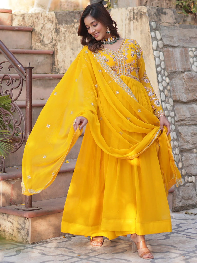 Artistic Yellow Thread Work Georgette Haldi Wear Gown With Dupatta