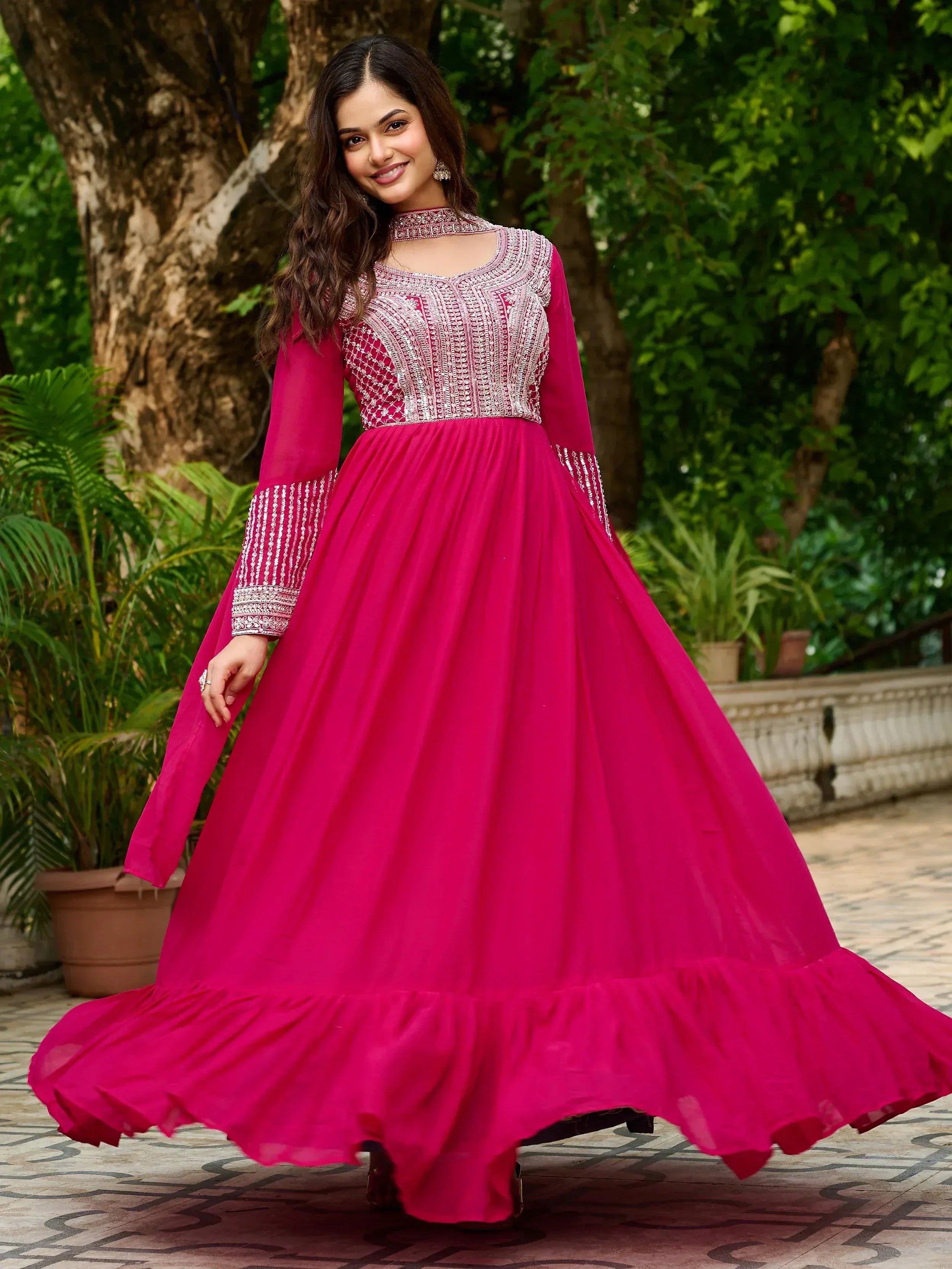 Fuchsia ethnic gown with silver embroidery, perfect for Indian weddings and festive occasions
