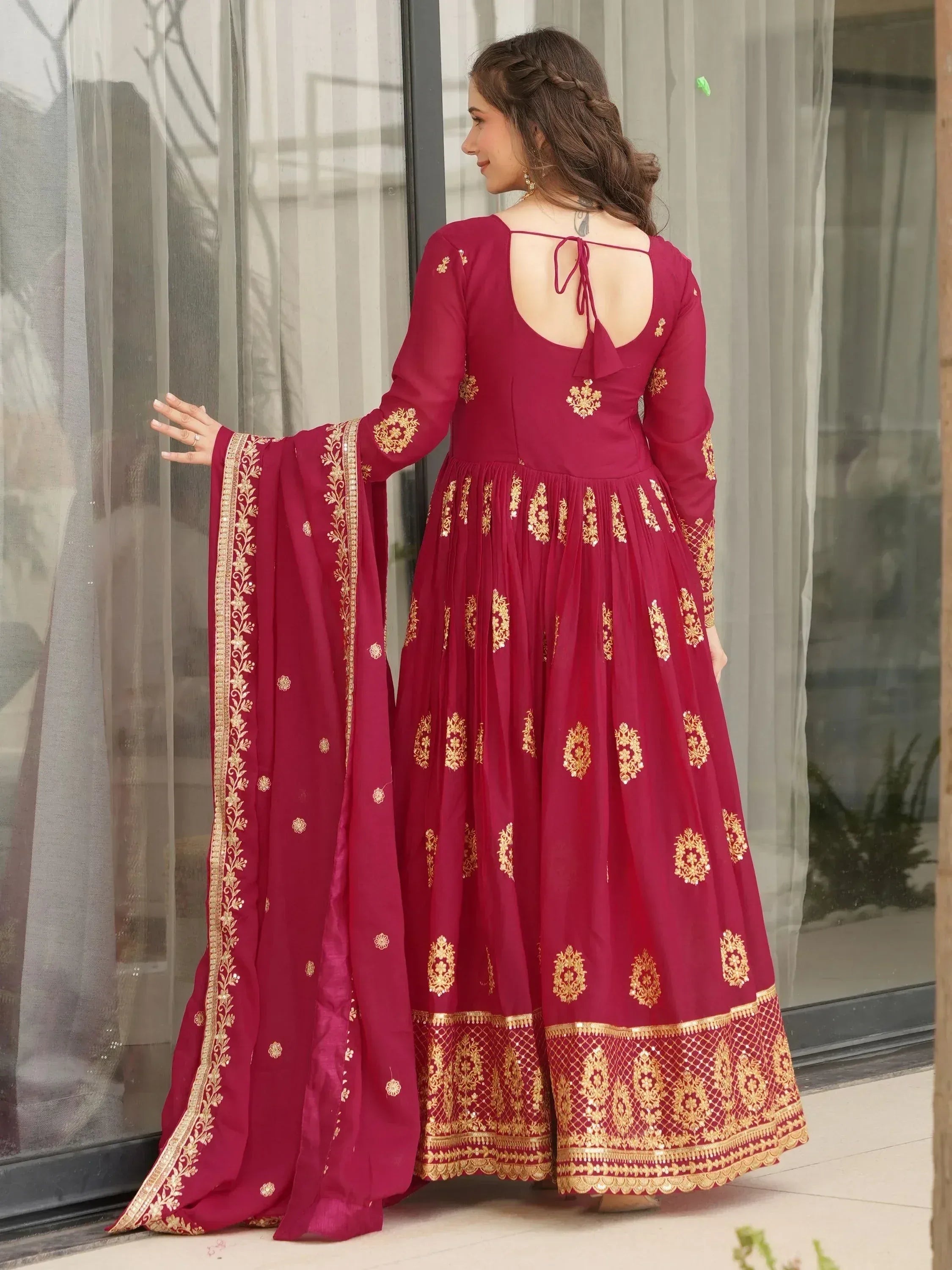 Maroon ethnic anarkali with gold embroidery and back tie, perfect for Indian occasions