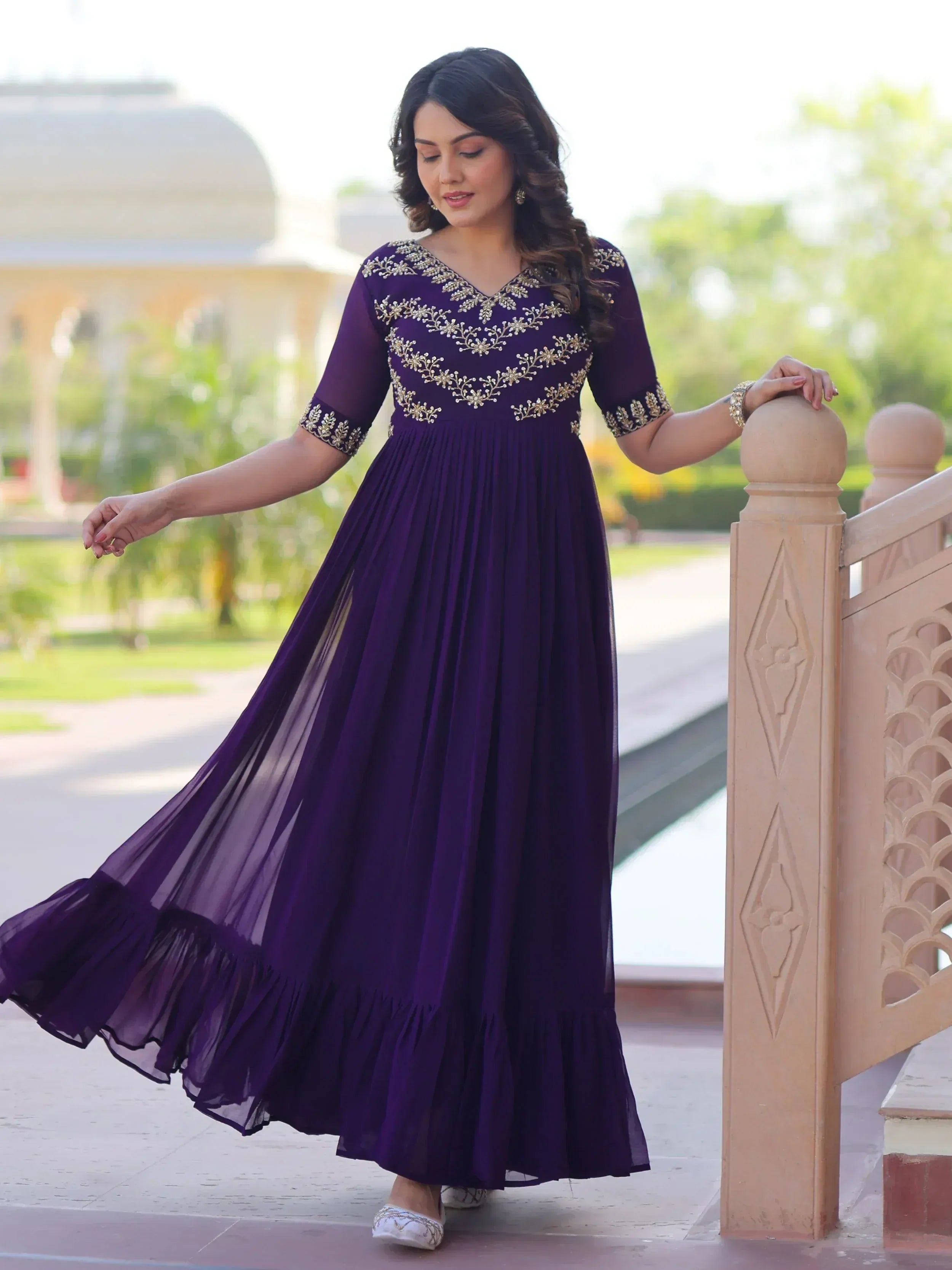 Purple ethnic gown with gold embroidery, pleated skirt, perfect for Indian occasions