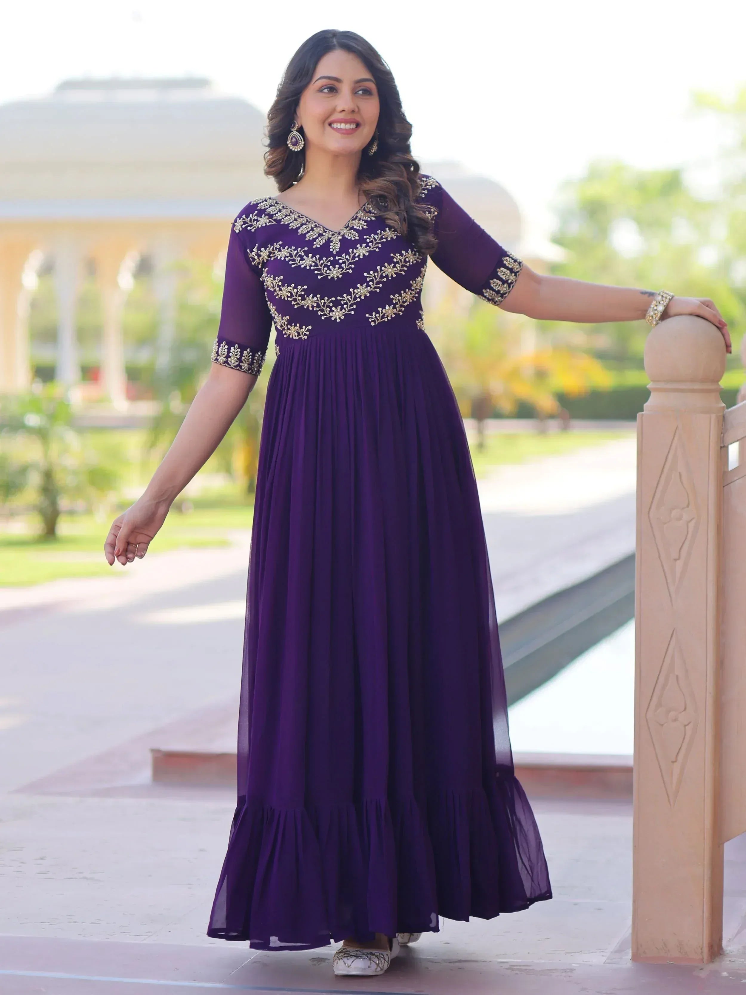 Purple ethnic gown with gold embroidery, perfect for Indian occasions and festive wear