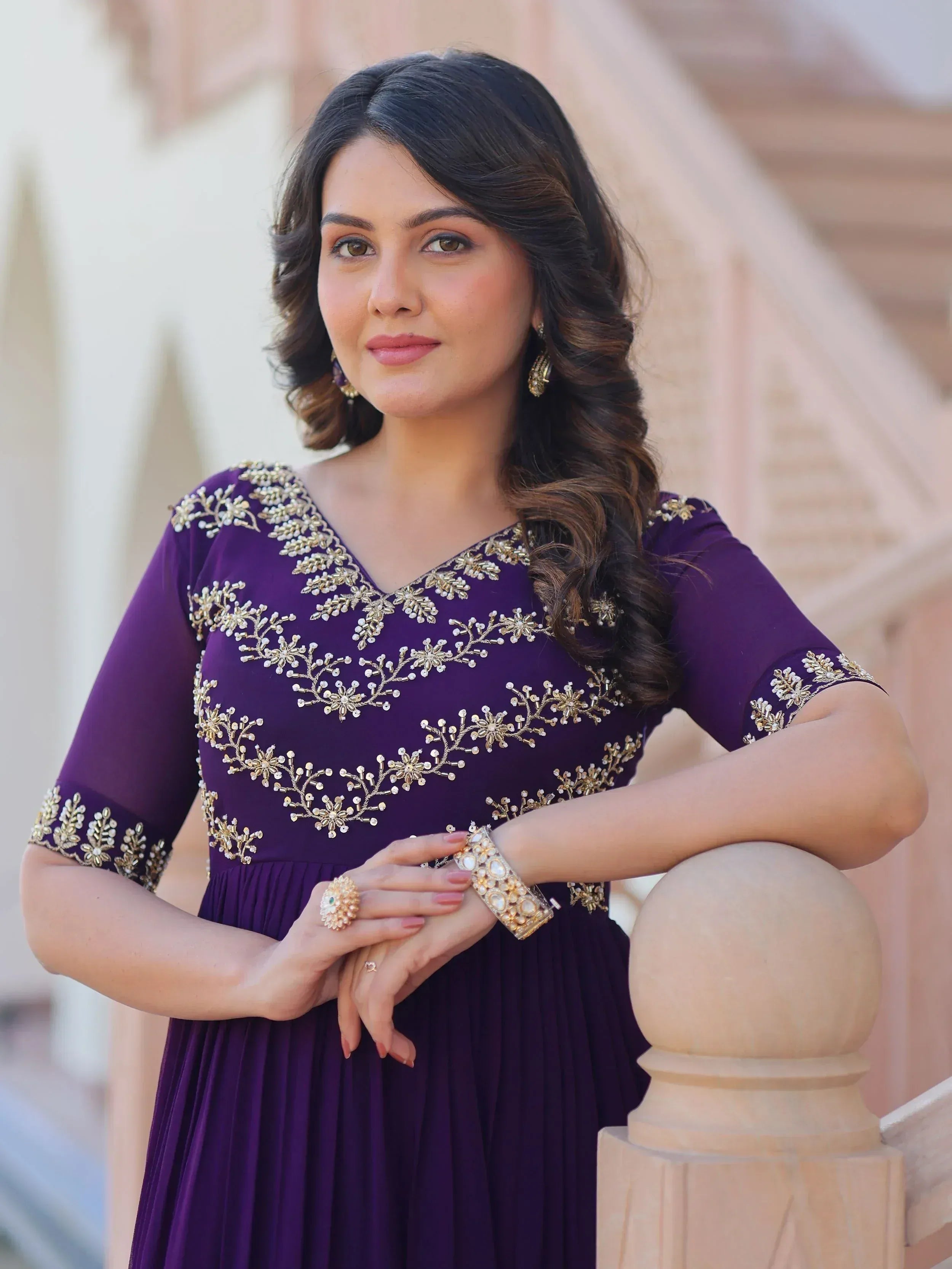 Purple ethnic gown with gold embroidery, perfect for Indian occasions and festive wear
