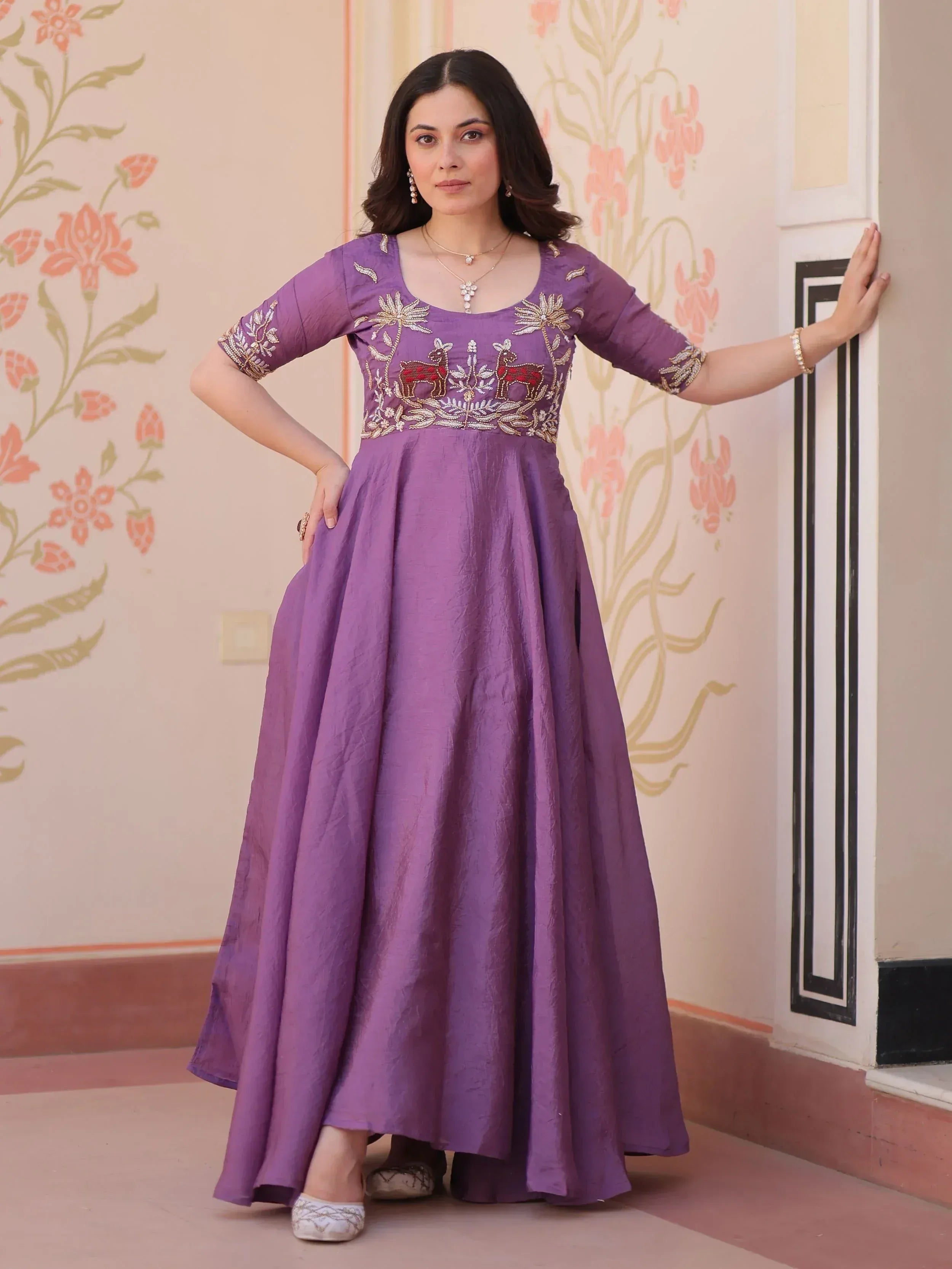 Purple ethnic gown with deer embroidery, perfect for Indian festive occasions and parties.