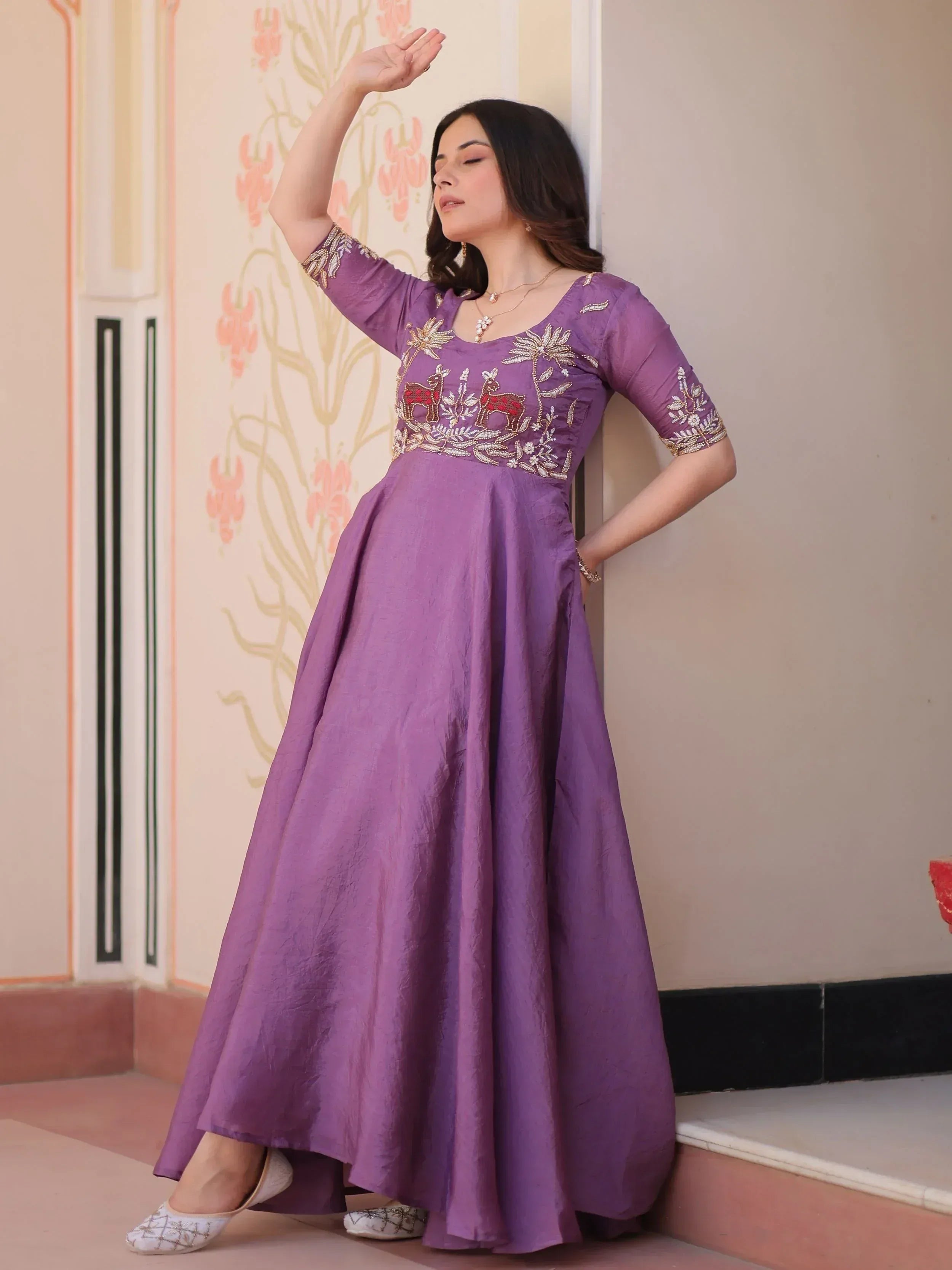 Purple ethnic gown with deer embroidery, perfect for Indian occasions and festive wear.