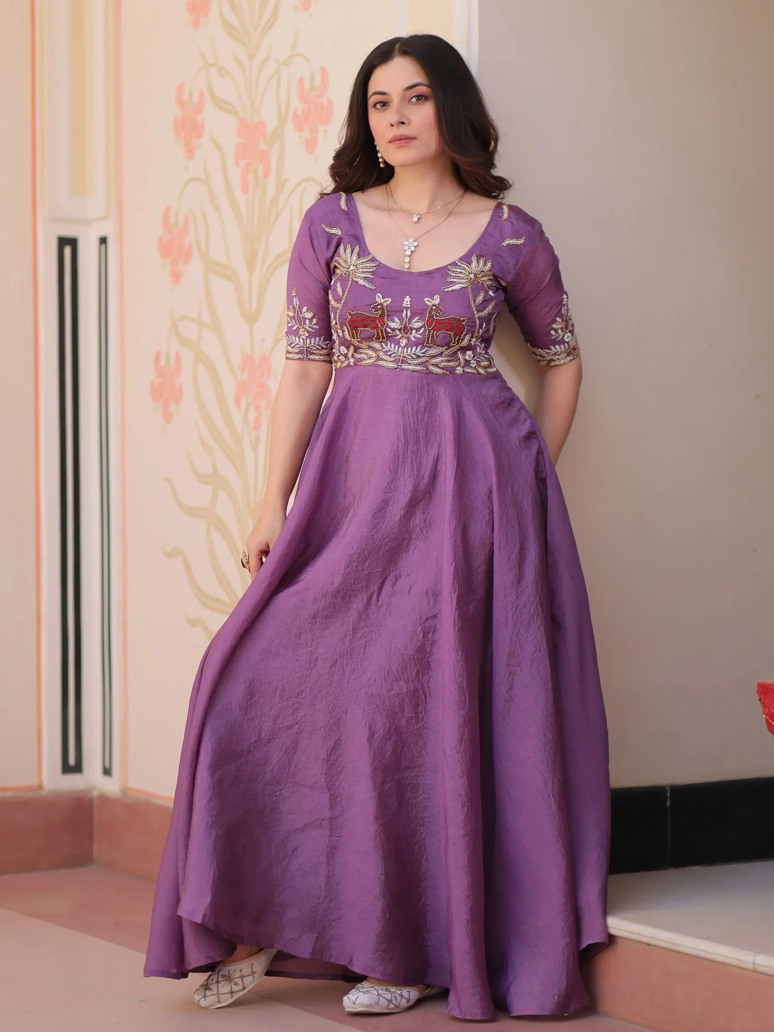 Purple ethnic gown with deer embroidery, perfect for Indian occasions and festive wear.