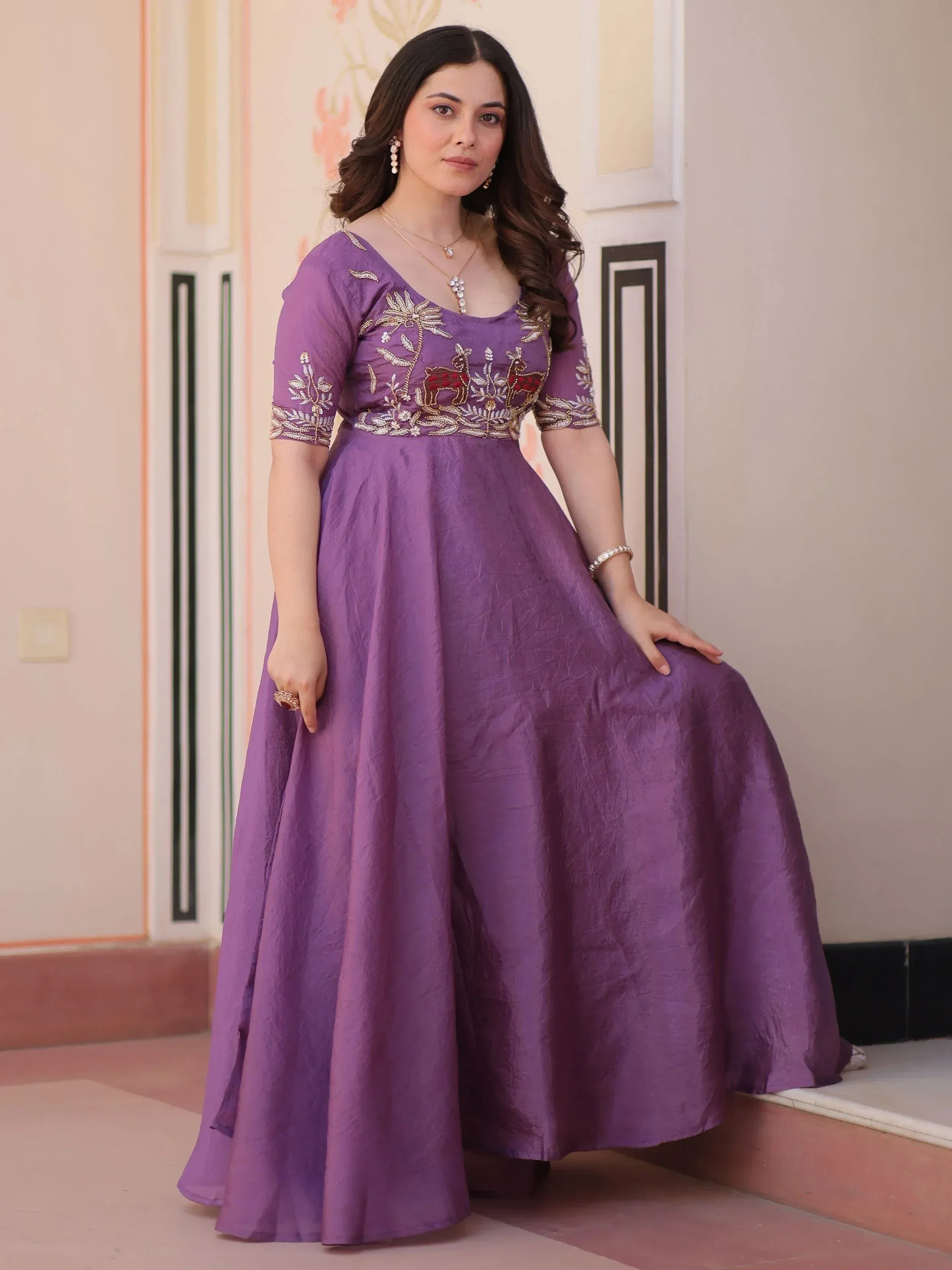 Purple embroidered ethnic gown with deer motif, perfect for Indian occasions and festive wear