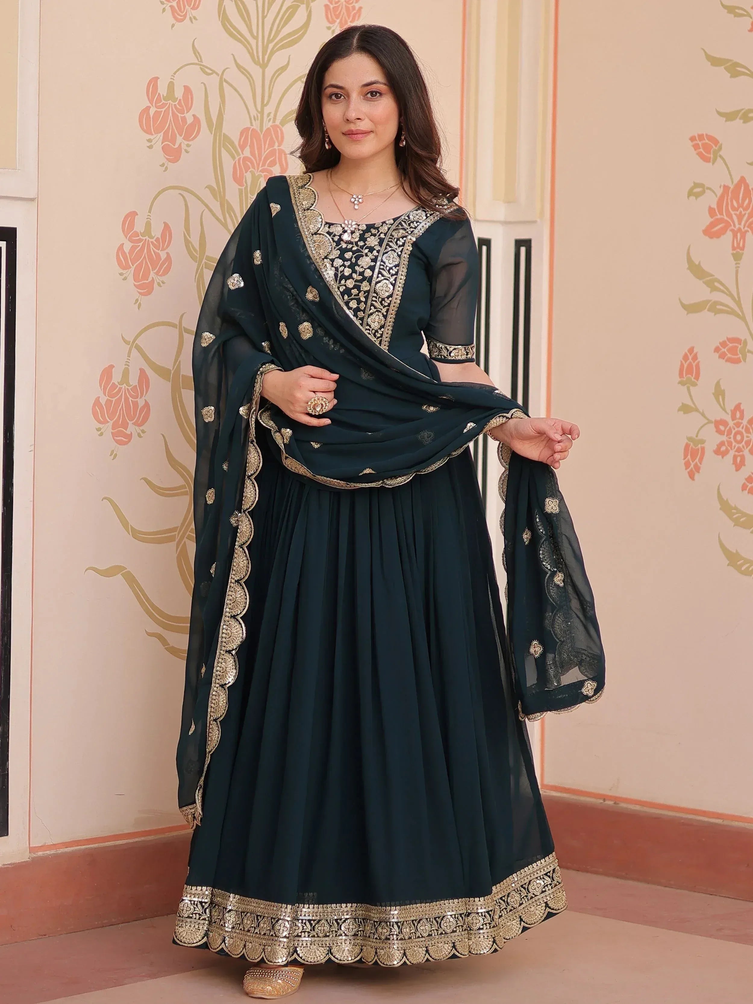 Dark green embroidered anarkali suit with gold detailing, perfect for Indian ethnic occasions