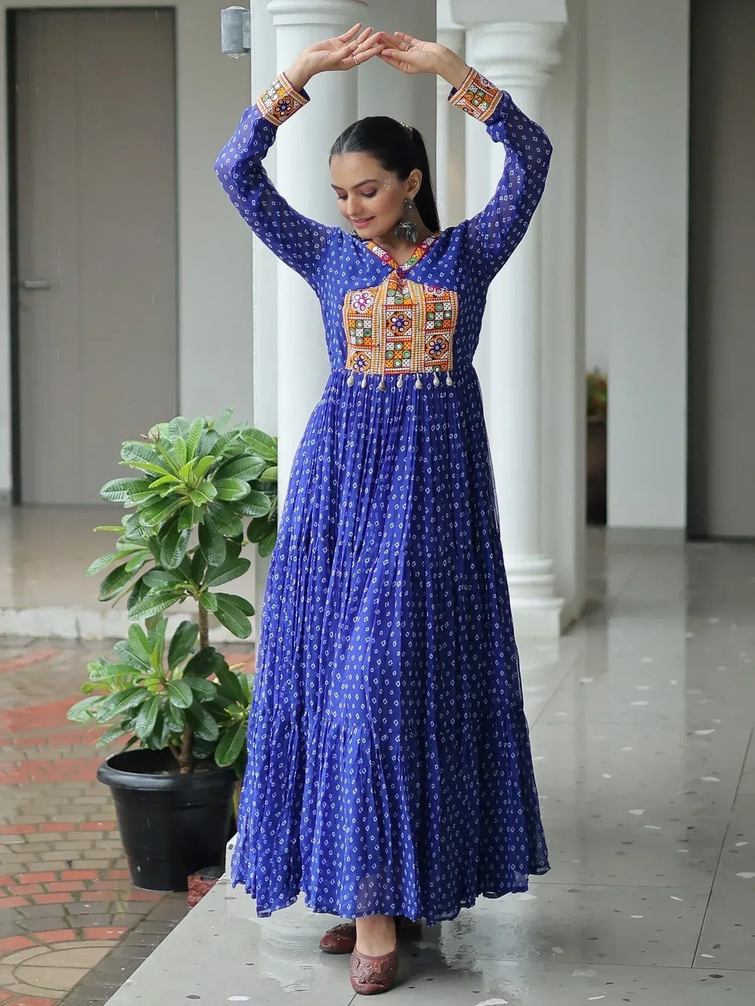 Blue ethnic gown with colorful embroidery, perfect for Indian occasions and festive wear