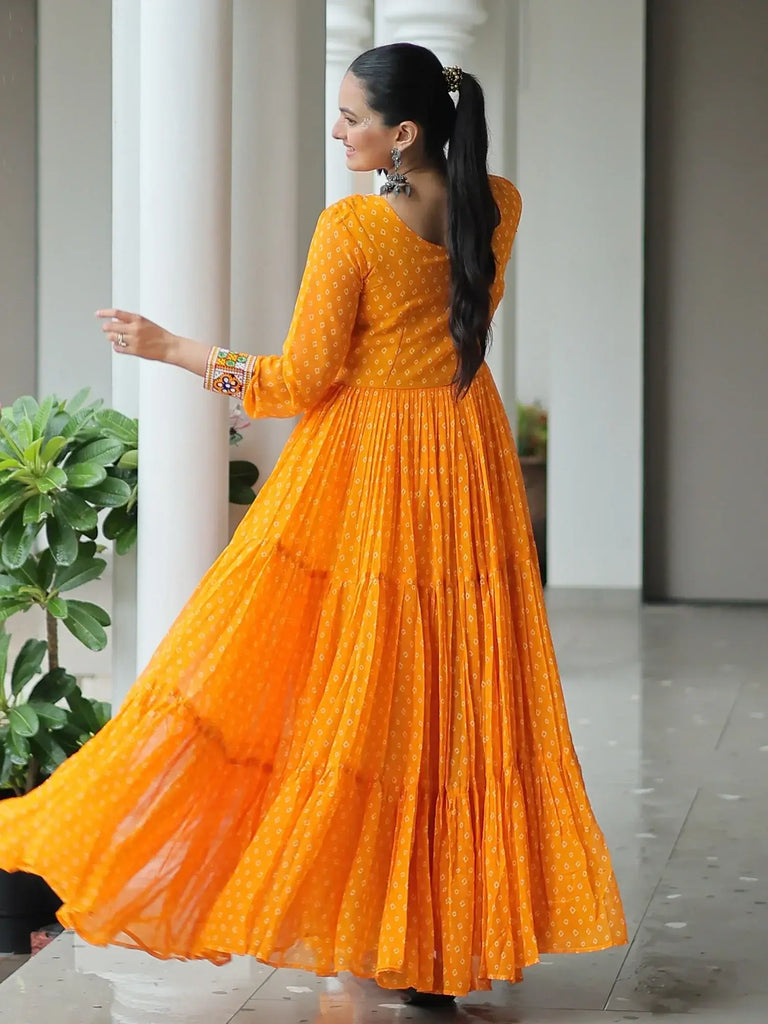 Impressive Yellow Kutchi Work Georgette Navratri Wear Gown