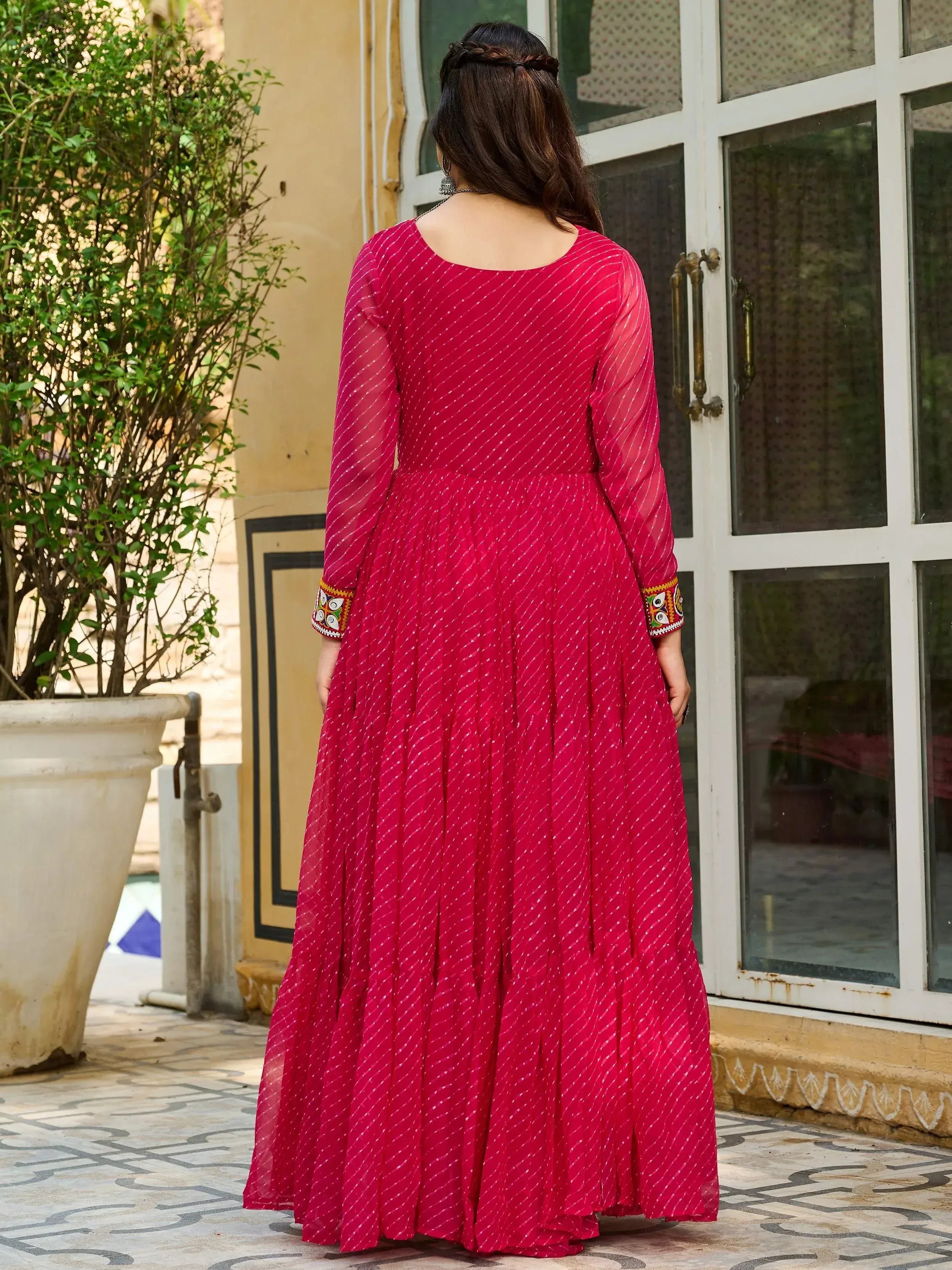 Pink ethnic gown with embroidered sleeves, back view, Indian designer wear