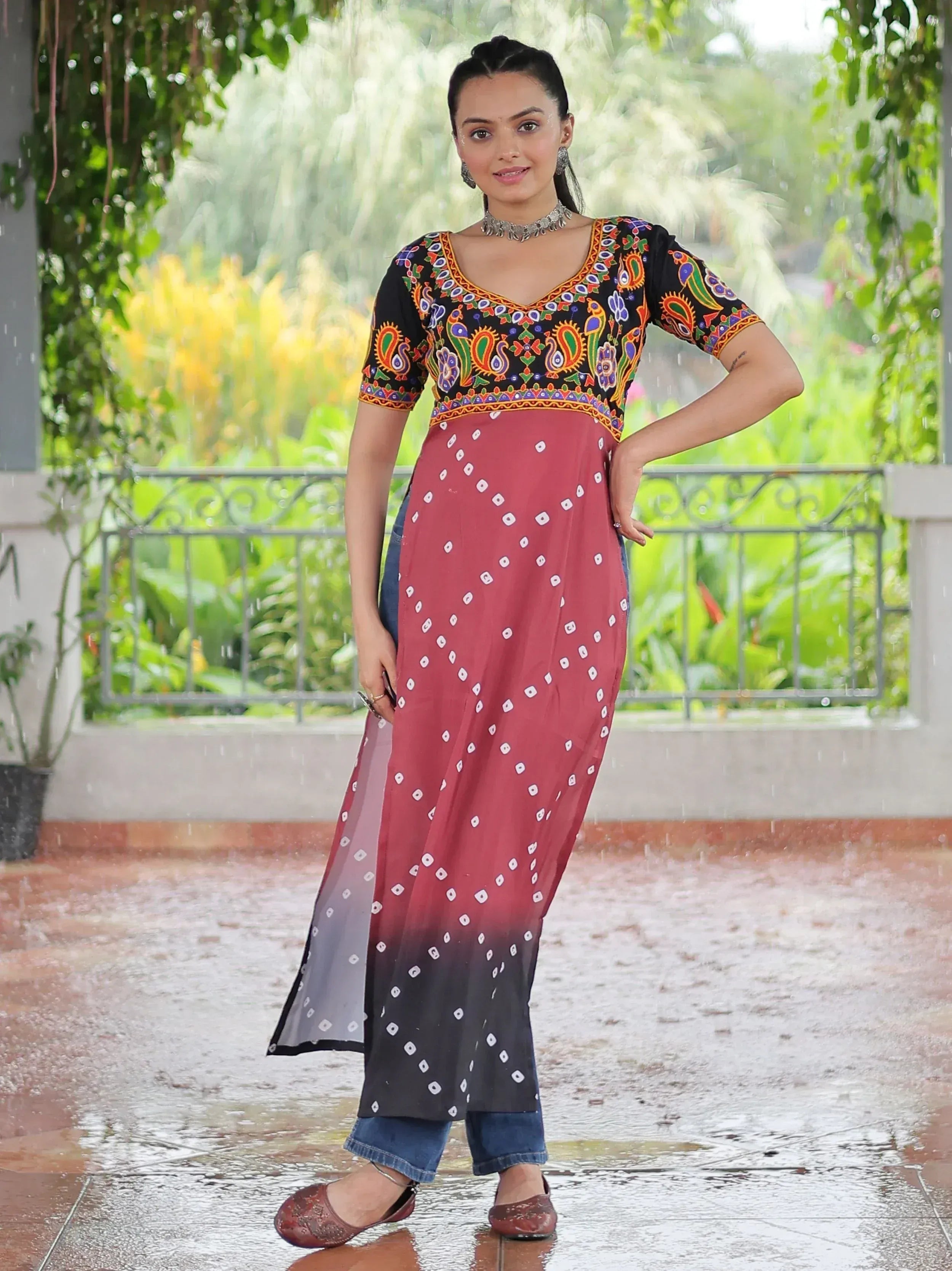 Woman in colorful embroidered kurta with ombre bandhani palazzo, styled for ethnic wear