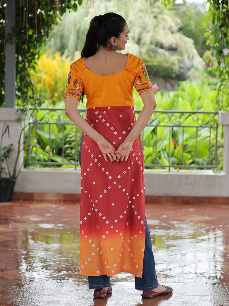 Impressive Yellow Rayon Leheriya Print Navratri Wear Nayra Cut Kurti