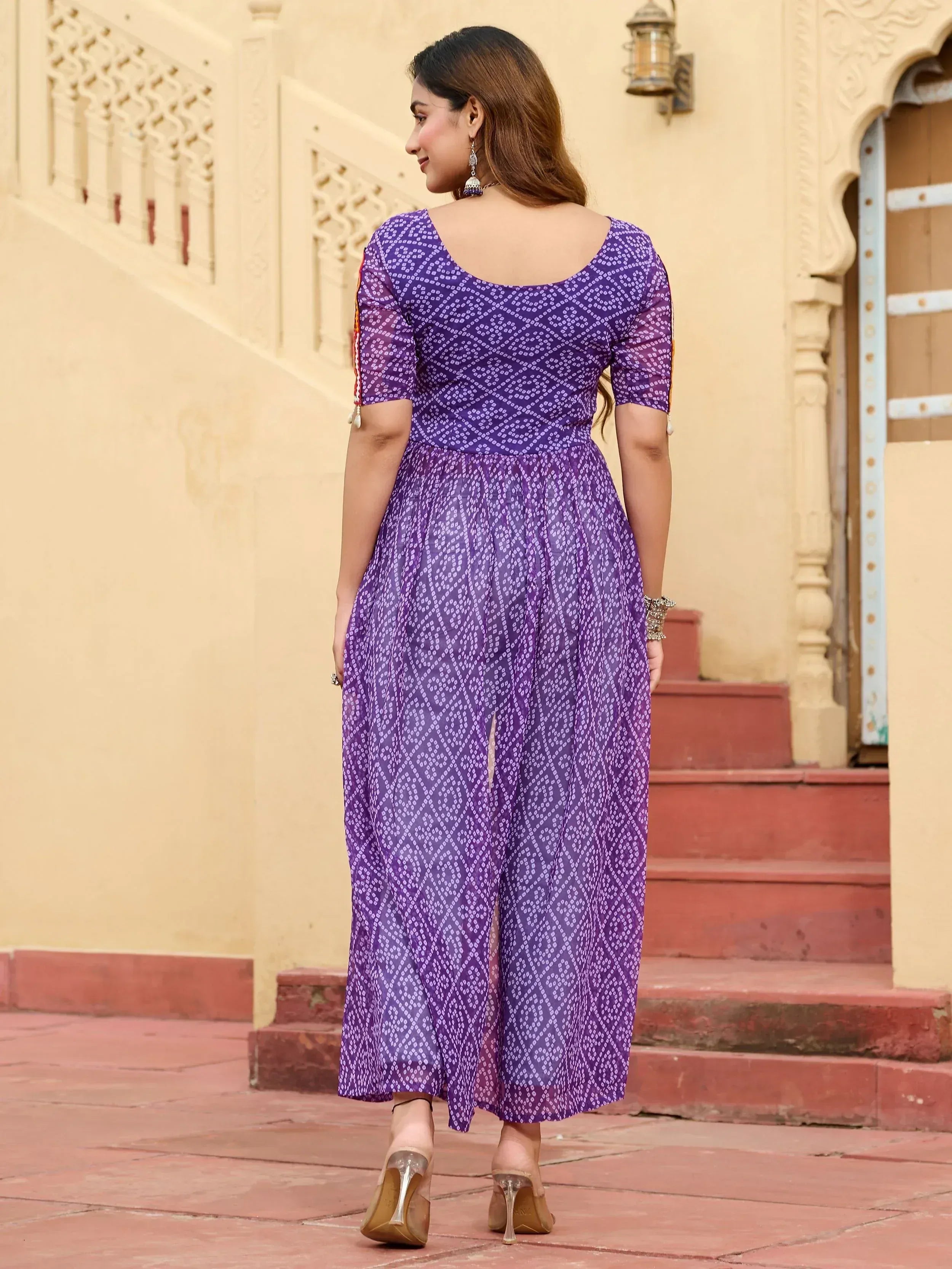 Purple printed ethnic gown with back view, perfect for Indian occasions and festive wear.