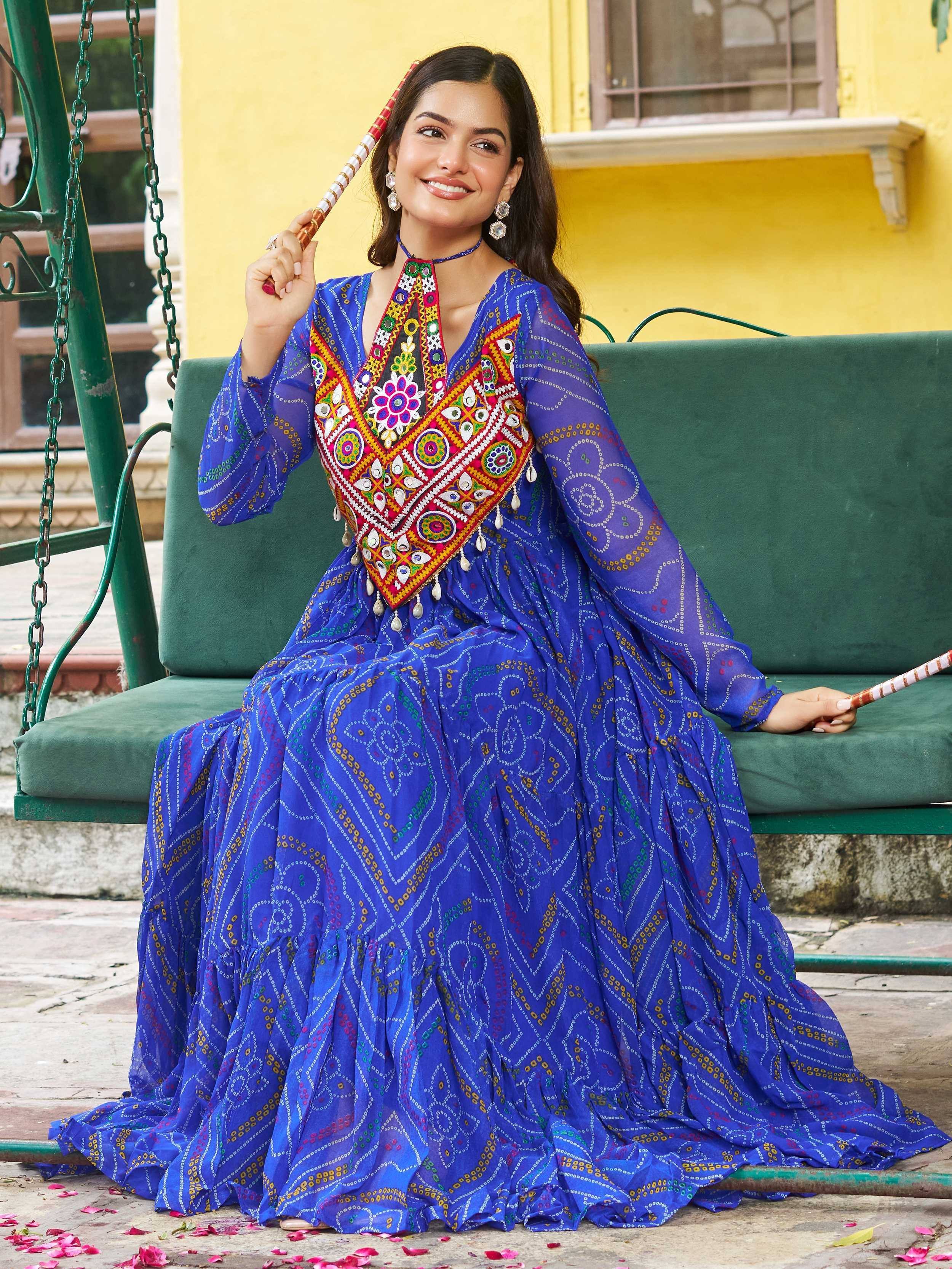 Blue embroidered ethnic gown with mirror work, perfect for Indian festivals and celebrations